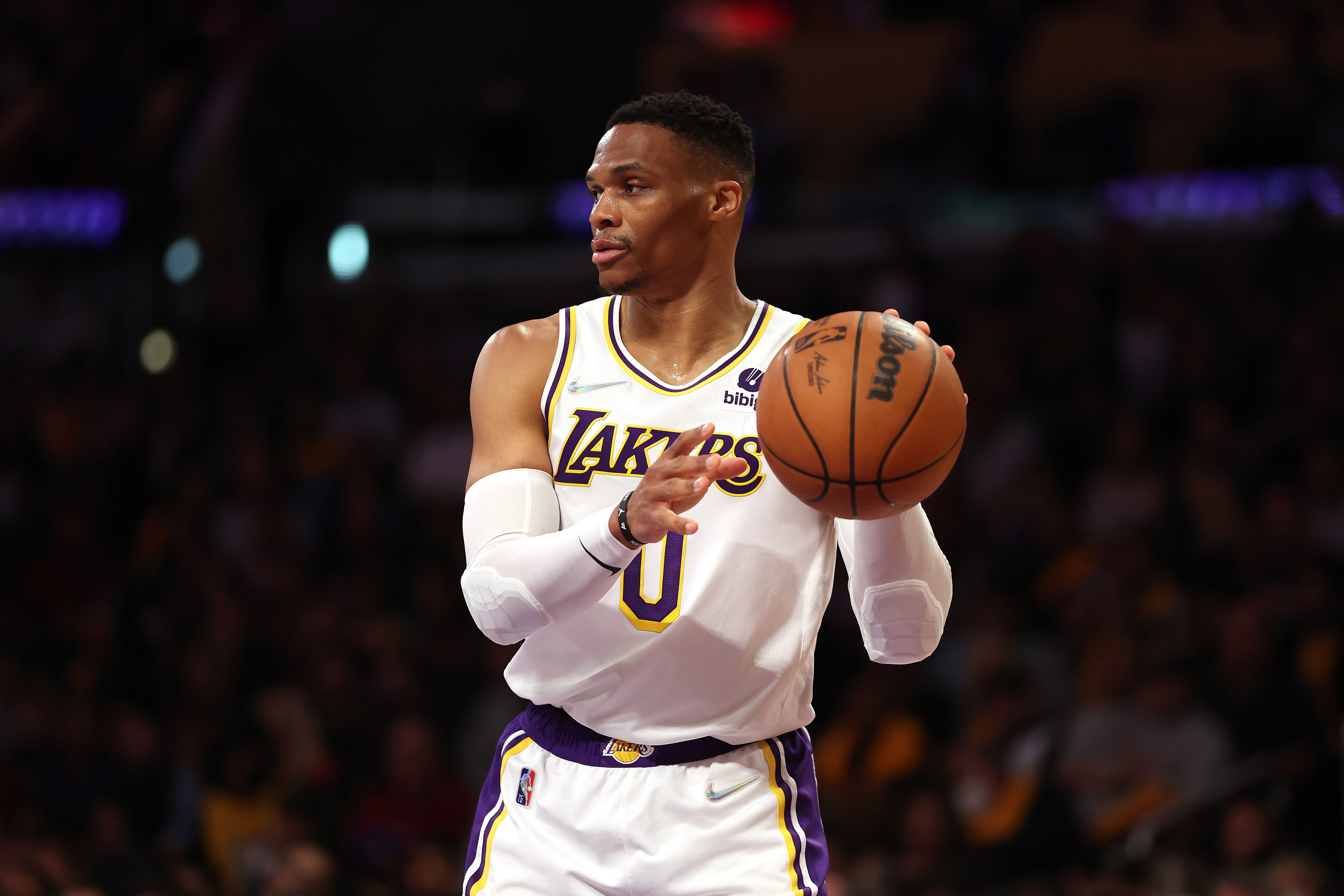 LOS ANGELES, CALIFORNIA - APRIL 03: Russell Westbrook #0 of the Los Angeles Lakers looks on during the first half of a game against the Denver Nuggets at Crypto.com Arena on April 03, 2022 in Los Angeles, California. NOTE TO USER: User expressly acknowledges and agrees that, by downloading and/or using this Photograph, user is consenting to the terms and conditions of the Getty Images License Agreement. Mandatory Copyright Notice: Copyright 2022 NBAE (Photo by Sean M. Haffey/Getty Images)