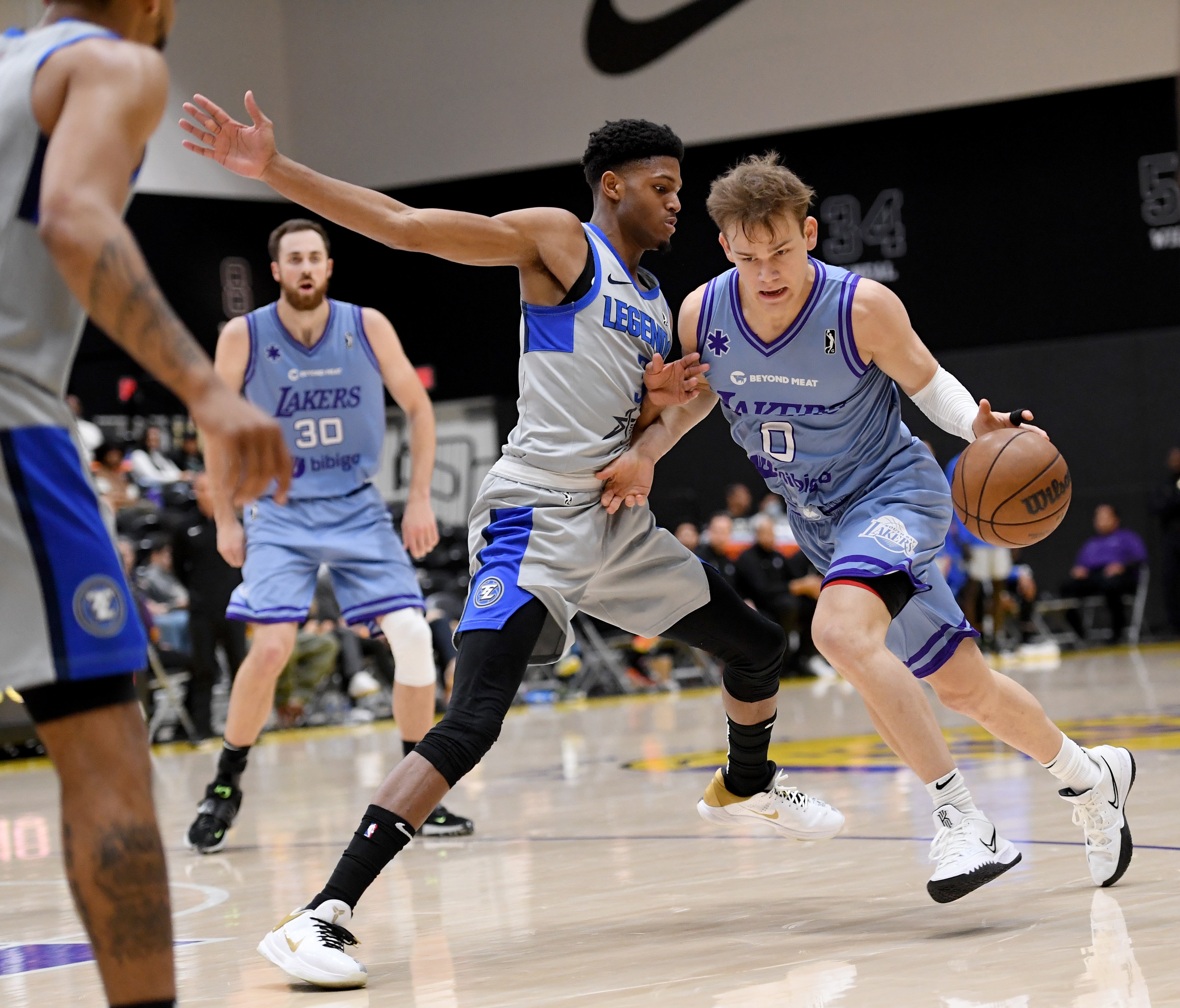 EL SEGUNDO, CA - MARCH 20:  Mac McClung #0 of the South Bay Lakers drives to the basket against Isaiah Brown #3 of the Texas Legends on March 20, 2022 at UCLA Health Training Center in El Segundo, California. NOTE TO USER: User expressly acknowledges and agrees that, by downloading and/or using this photograph, User is consenting to the terms and conditions of Getty Images License Agreement. Mandatory Copyright Notice: Copyright 2022 NBAE (Photo by Juan Ocampo/NBAE via Getty Images)