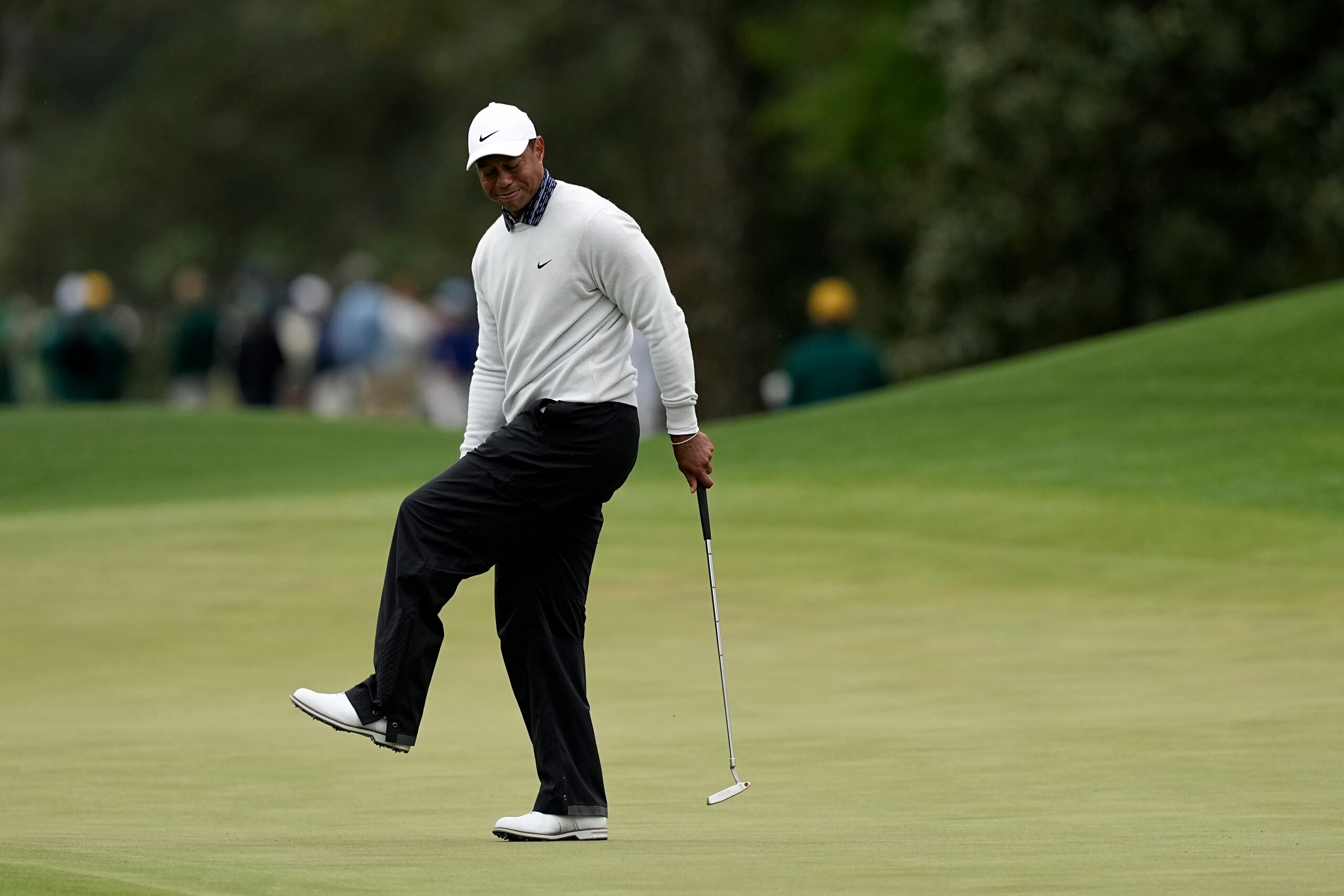 Tiger Woods reacts after missing a birdie putt on the eighth green during the third round at the Masters golf tournament on Saturday, April 9, 2022, in Augusta, Ga. (AP Photo/David J. Phillip) Tiger Woods reacts after missing a birdie putt on the eighth green during the third round at the Masters golf tournament on Saturday, April 9, 2022, in Augusta, Ga. (AP Photo/David J. Phillip)