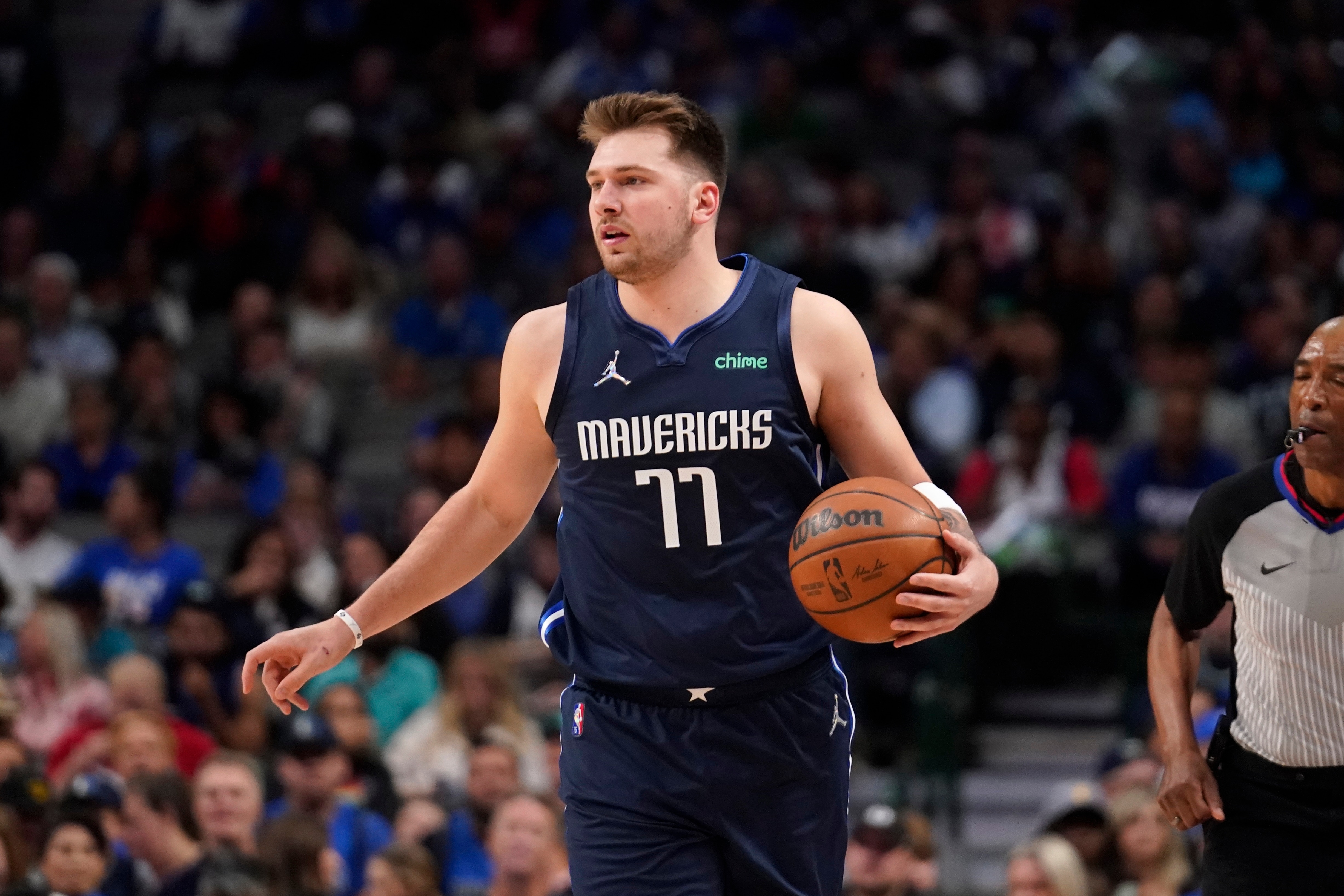 Dallas Mavericks guard Luka Doncic handles the ball during an NBA basketball game against the Portland Trail Blazers, Friday, April 8, 2022, in Dallas. (AP Photo/Tony Gutierrez)