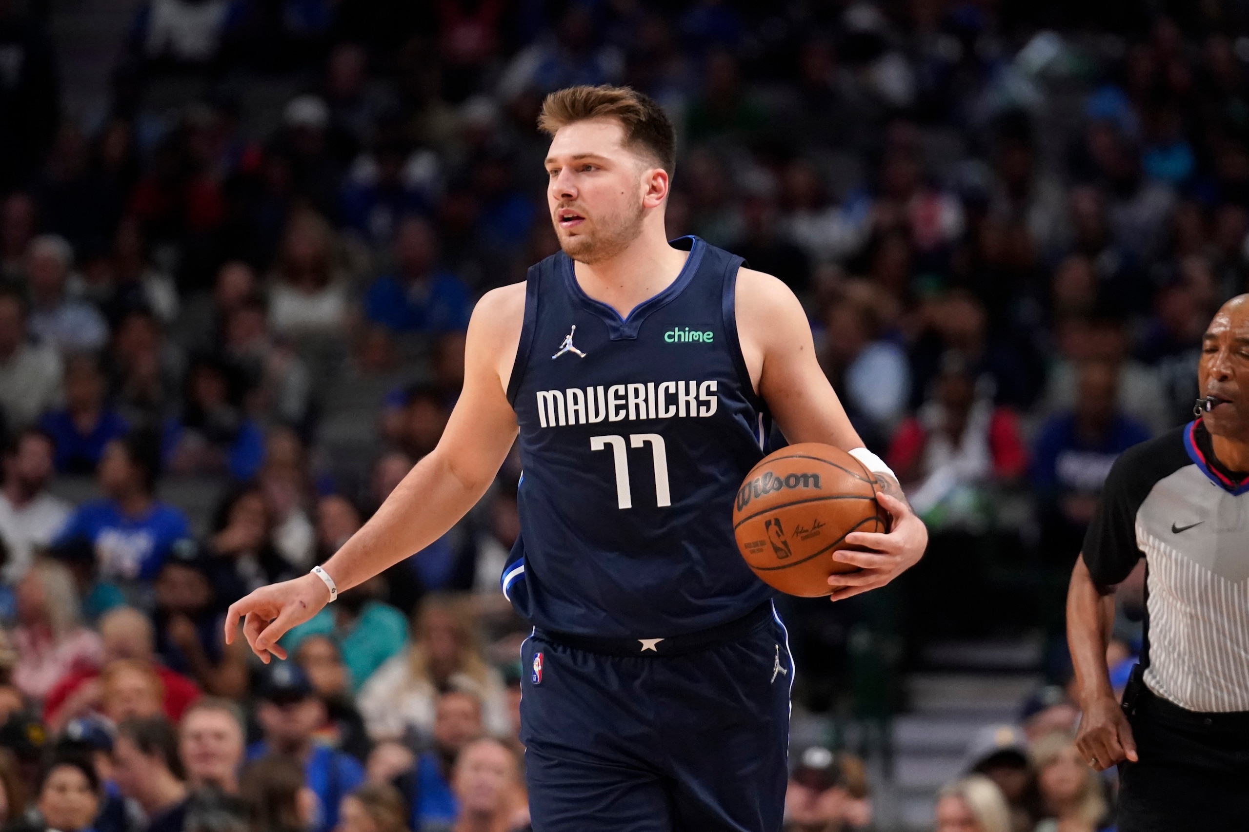 Dallas Mavericks guard Luka Doncic handles the ball during an NBA basketball game against the Portland Trail Blazers, Friday, April 8, 2022, in Dallas. (AP Photo/Tony Gutierrez)