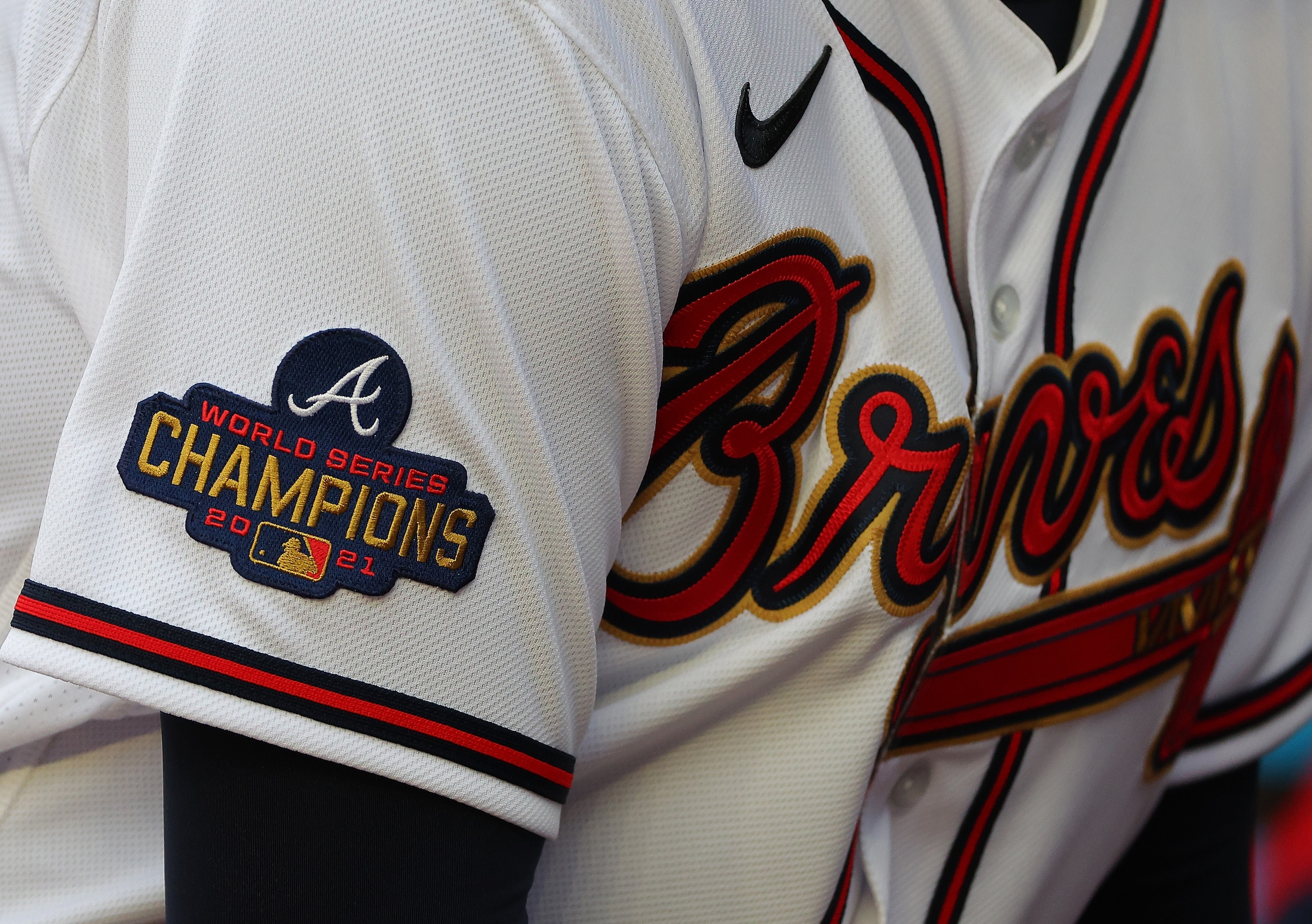 ATLANTA, GEORGIA - APRIL 08:  An up close view of the World Series Champions patch on the sleeve of the jersey of Austin Riley #27 of the Atlanta Braves prior to the game against the Cincinnati Reds at Truist Park on April 08, 2022 in Atlanta, Georgia. (Photo by Kevin C. Cox/Getty Images)