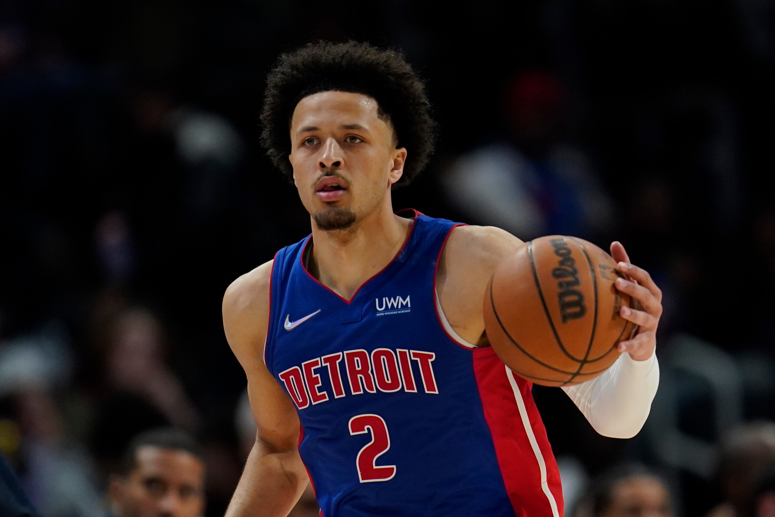 Detroit Pistons guard Cade Cunningham plays against the Milwaukee Bucks in the second half of an NBA basketball game in Detroit, Friday, April 8, 2022. (AP Photo/Paul Sancya)