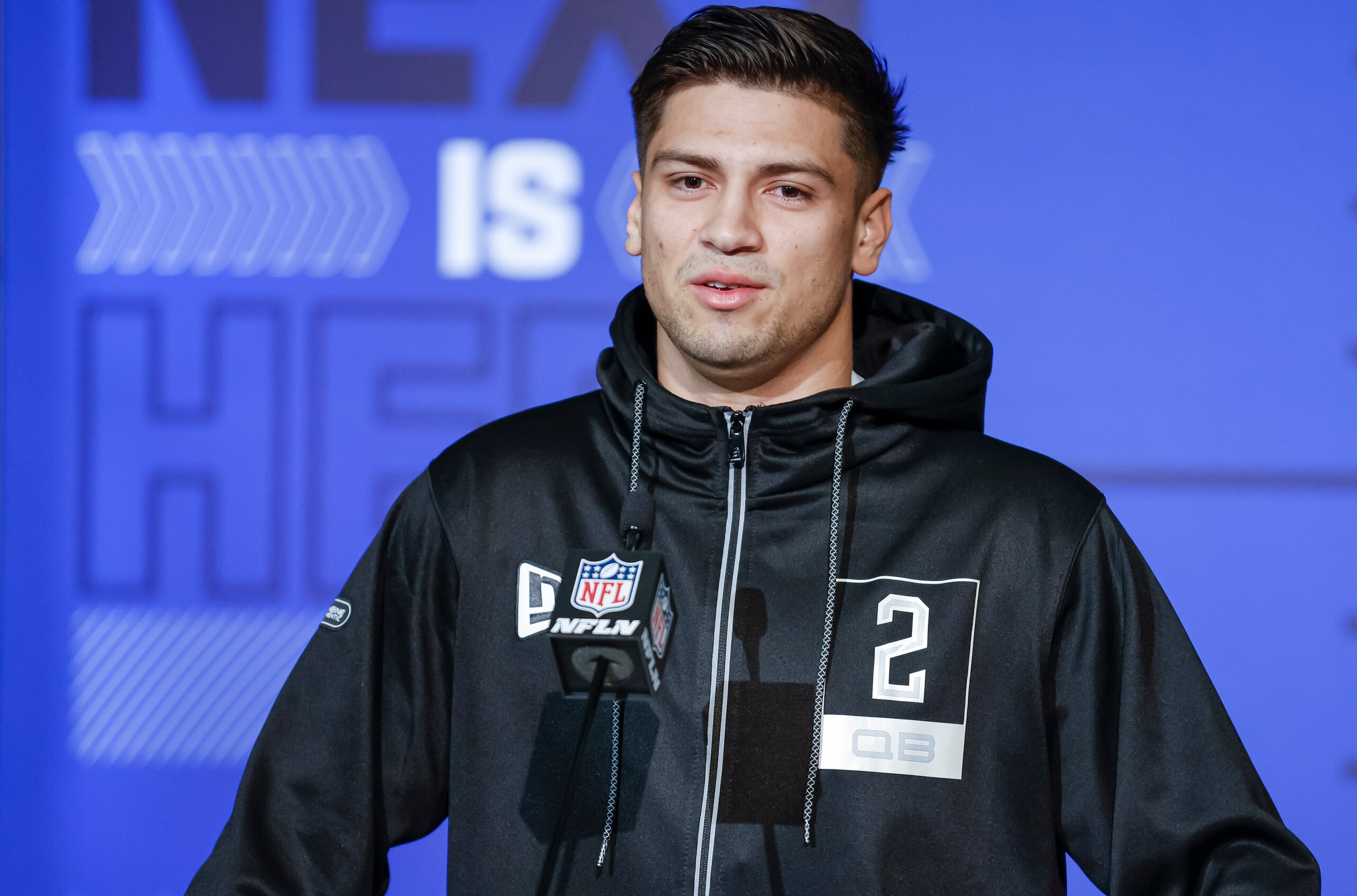 INDIANAPOLIS, IN - MAR 02: Matt Corral #QB02 of the Mississippi Rebels speaks to reporters during the NFL Draft Combine at the Indiana Convention Center on March 2, 2022 in Indianapolis, Indiana. (Photo by Michael Hickey/Getty Images)