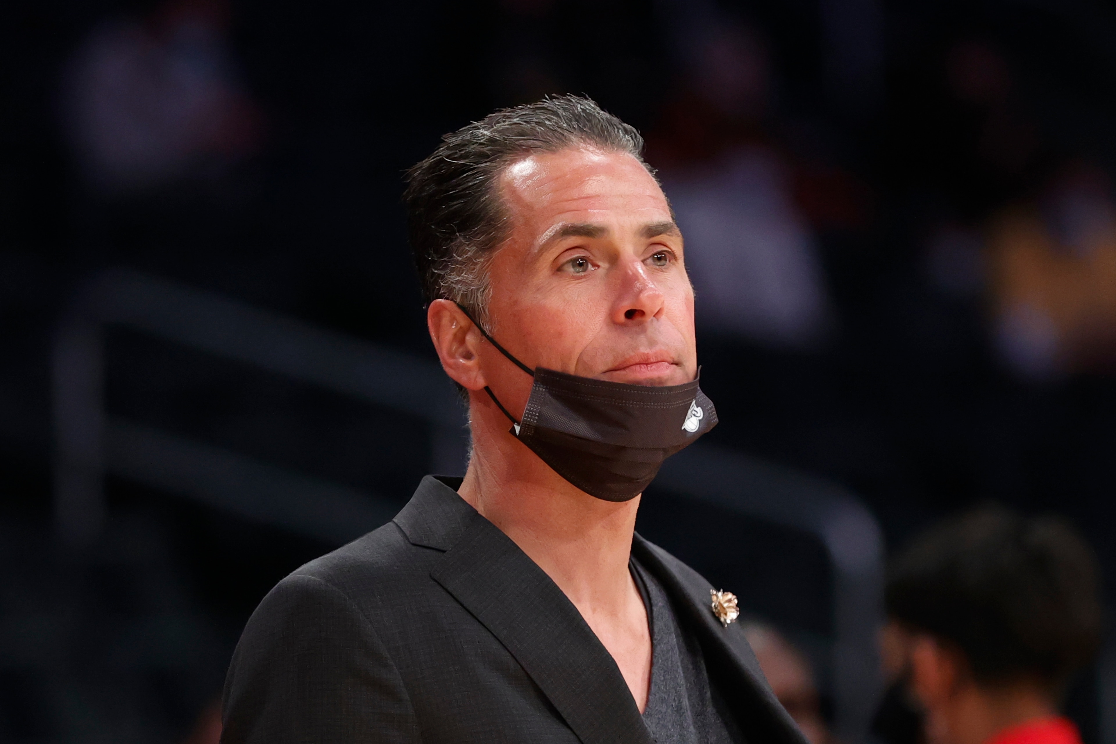 Lakers General Manager Rob Pelinka watch his team warm up before an NBA basketball game against the Minnesota Timberwolves in Los Angeles, Sunday, Jan. 2, 2022. (AP Photo/Ringo H.W. Chiu)