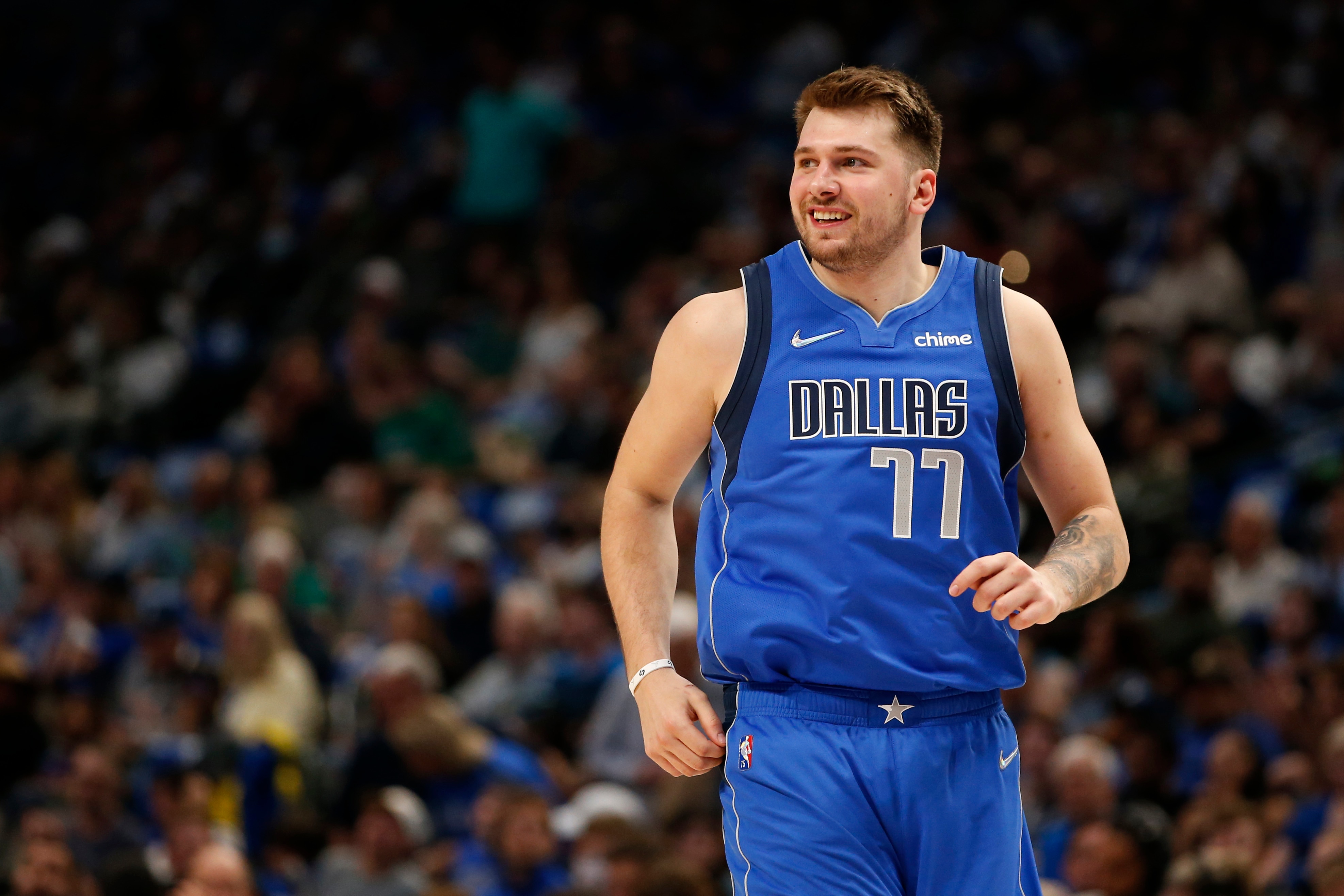 DALLAS, TEXAS - APRIL 10: Luka Doncic #77 of the Dallas Mavericks reacts after making a basket in the second half against the San Antonio Spurs at American Airlines Center on April 10, 2022 in Dallas, Texas. NOTE TO USER: User expressly acknowledges and agrees that, by downloading and or using this photograph, User is consenting to the terms and conditions of the Getty Images License Agreement.  (Photo by Tim Heitman/Getty Images)