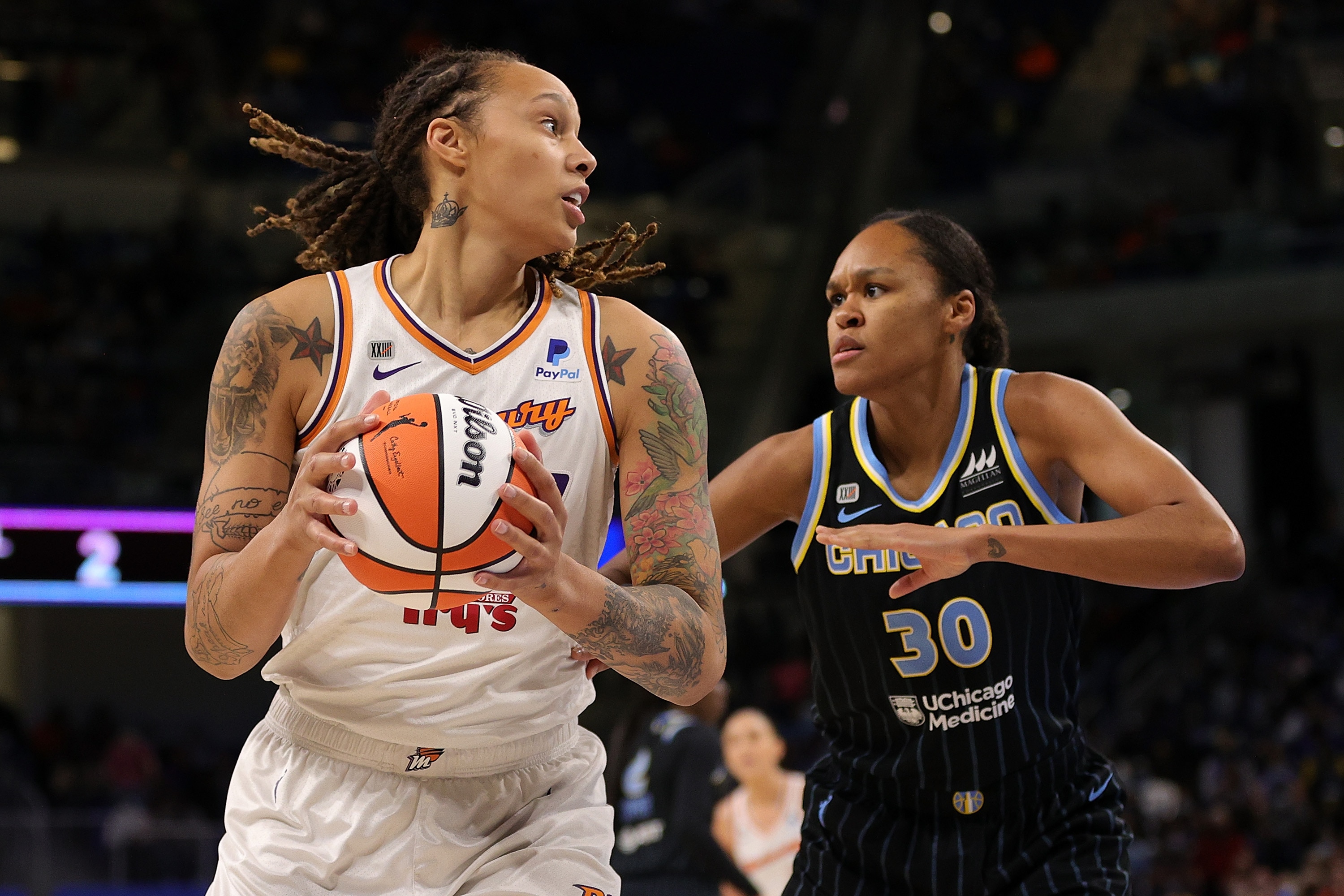 CHICAGO, ILLINOIS - OCTOBER 17: Brittney Griner #42 of the Phoenix Mercury is defended by Azurá Stevens #30 of the Chicago Sky during the first half of Game Four of the WNBA Finals at Wintrust Arena on October 17, 2021 in Chicago, Illinois. NOTE TO USER: User expressly acknowledges and agrees that, by downloading and or using this photograph, User is consenting to the terms and conditions of the Getty Images License Agreement. (Photo by Stacy Revere/Getty Images)