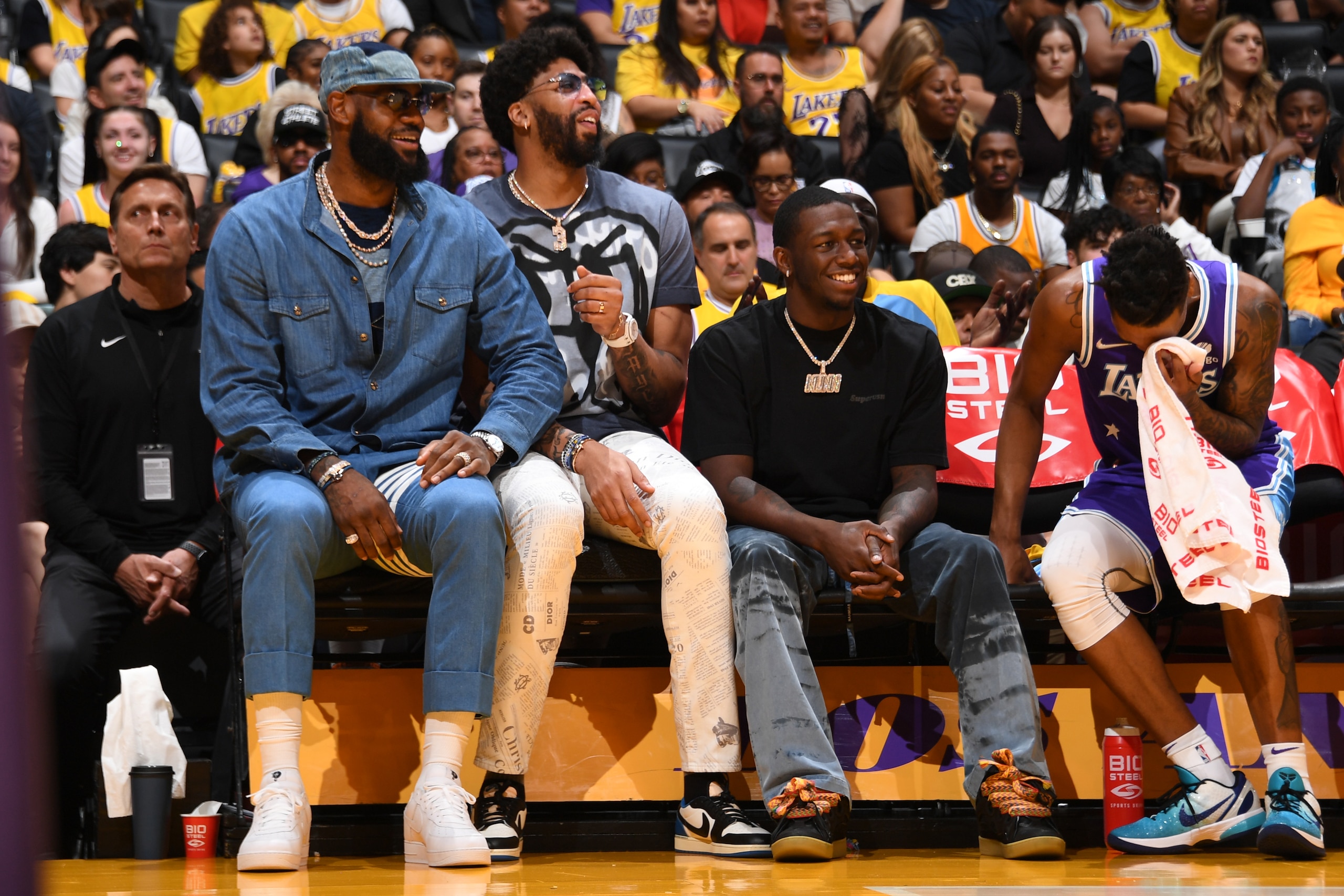 LOS ANGELES, CA - APRIL 8: LeBron James #6, Anthony Davis #3 and Kendrick Nunn #12 of the Los Angeles Lakers smile during the game against the Oklahoma City Thunder on April 8, 2022 at Crypto.Com Arena in Los Angeles, California. NOTE TO USER: User expressly acknowledges and agrees that, by downloading and/or using this Photograph, user is consenting to the terms and conditions of the Getty Images License Agreement. Mandatory Copyright Notice: Copyright 2022 NBAE (Photo by Adam Pantozzi/NBAE via Getty Images)
