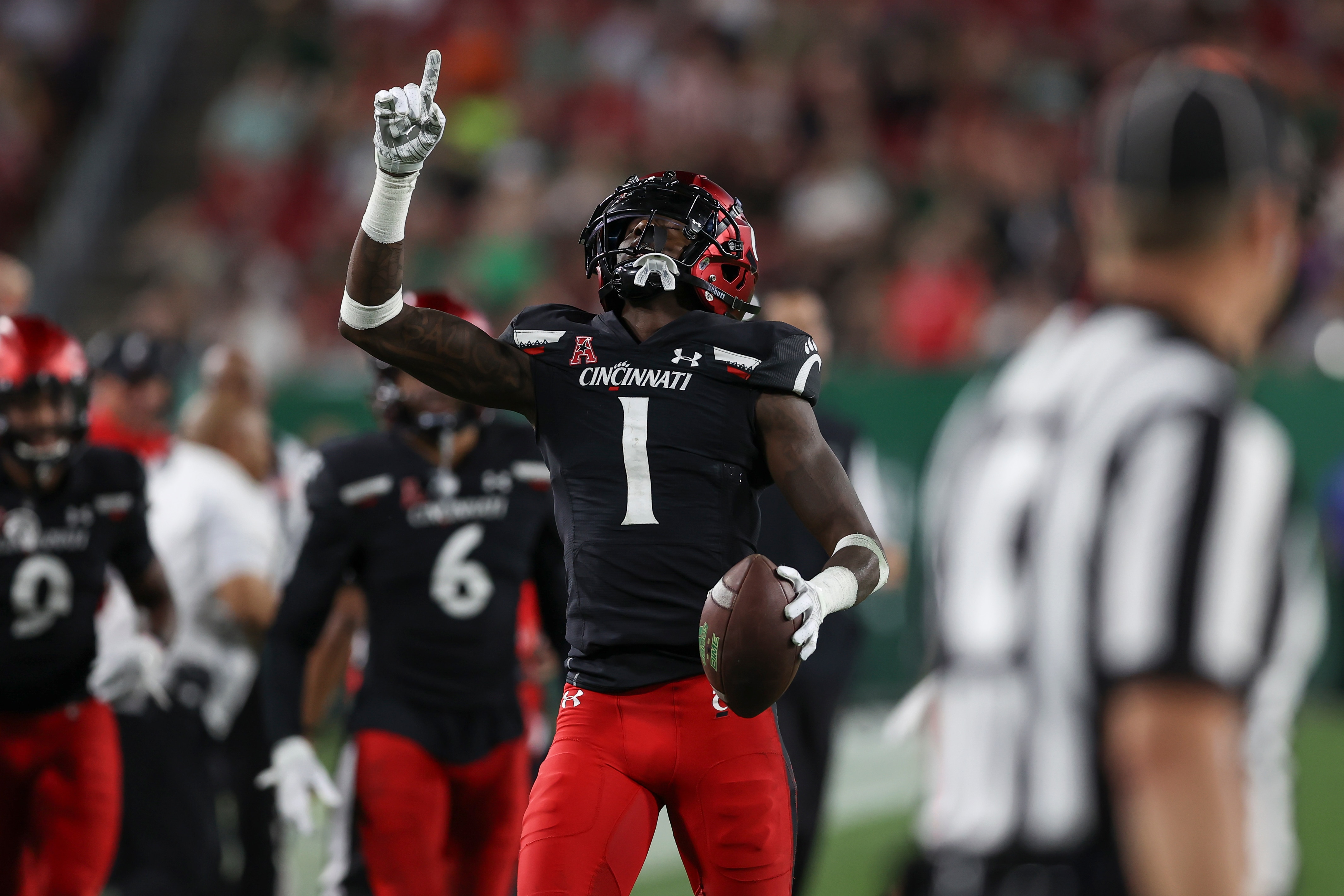 TAMPA, FL - NOVEMBER 12: Cincinnati Bearcats cornerback Ahmad Gardner (1) celebrates after intercepting a pass in the 2nd quarter of the college football game between the Cincinnati Bearcats and South Florida Bulls on November  12, 2021 at Raymond James Stadium in Tampa, FL. (Photo by Mark LoMoglio/Icon Sportswire via Getty Images)