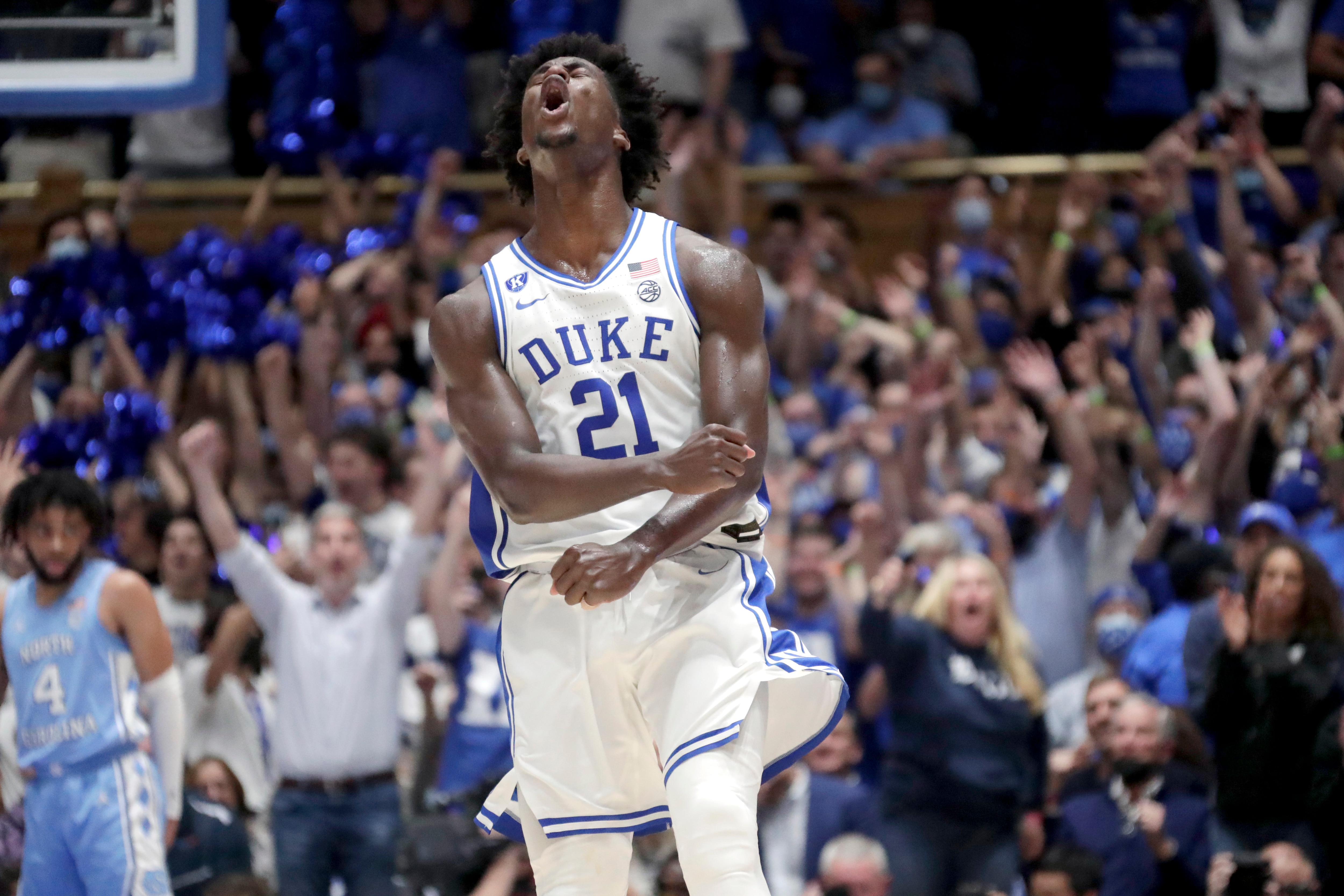 Duke forward AJ Griffin (21) celbrates after hitting a three point shot against North Carolina during the first half of an NCAA college basketball game Saturday, March 5, 2022, in Durham, N.C. (AP Photo/Chris Seward)