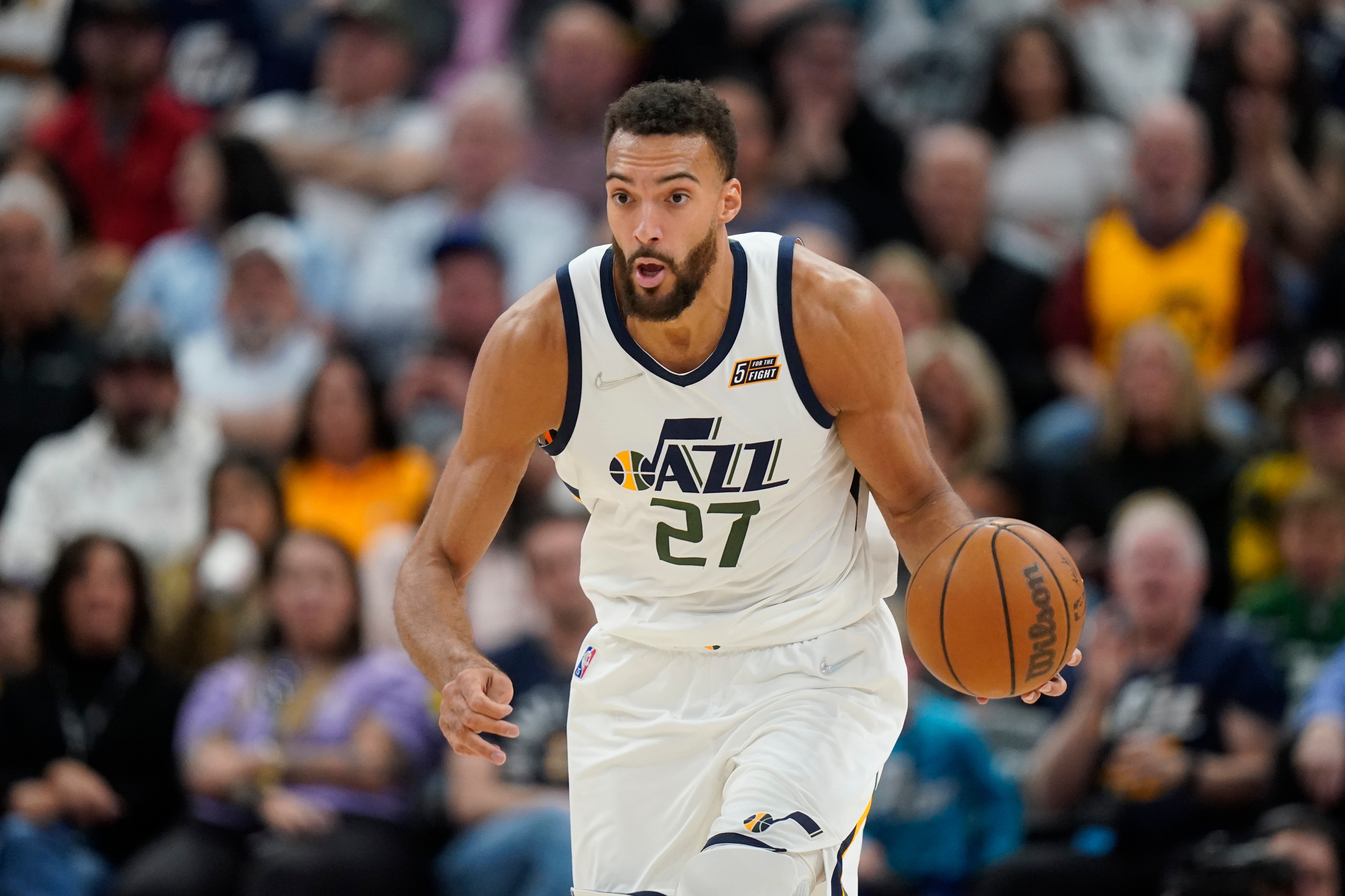 Utah Jazz center Rudy Gobert brings the ball up during the second half of the team's NBA basketball game against the Oklahoma City Thunder on Wednesday, April 6, 2022, in Salt Lake City. (AP Photo/Rick Bowmer)