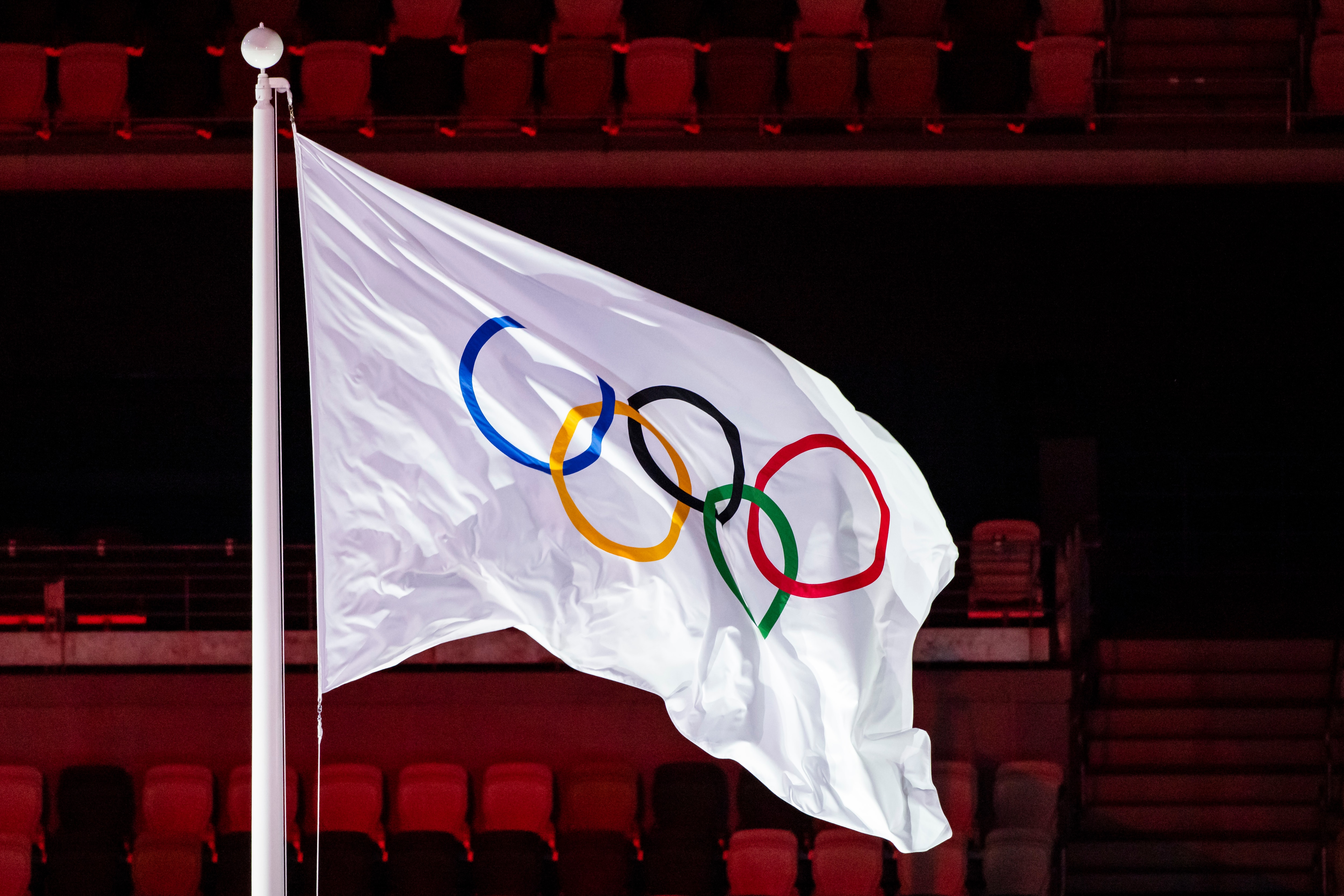 TOKYO, JAPAN - AUGUST 08: (BILD ZEITUNG OUT) . The Olympic flag flies during the Closing Ceremony of the Tokyo 2020 Olympic Games at Olympic Stadium on August 8, 2021 in Tokyo, Japan. (Photo by Tom Weller/DeFodi Images via Getty Images)