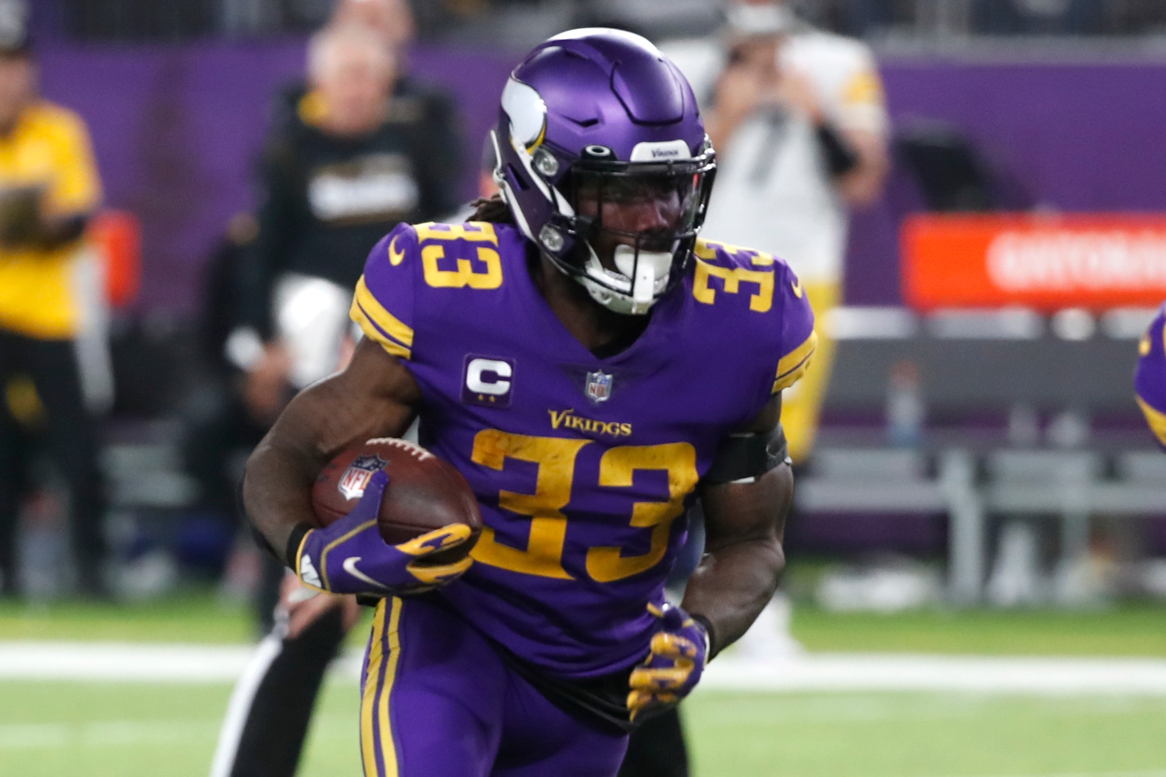 Minnesota Vikings running back Dalvin Cook (33) carries the ball up field during the second half of an NFL football game against the Pittsburgh Steelers, Thursday, Dec. 9, 2021, in Minneapolis. (AP Photo/Bruce Kluckhohn)