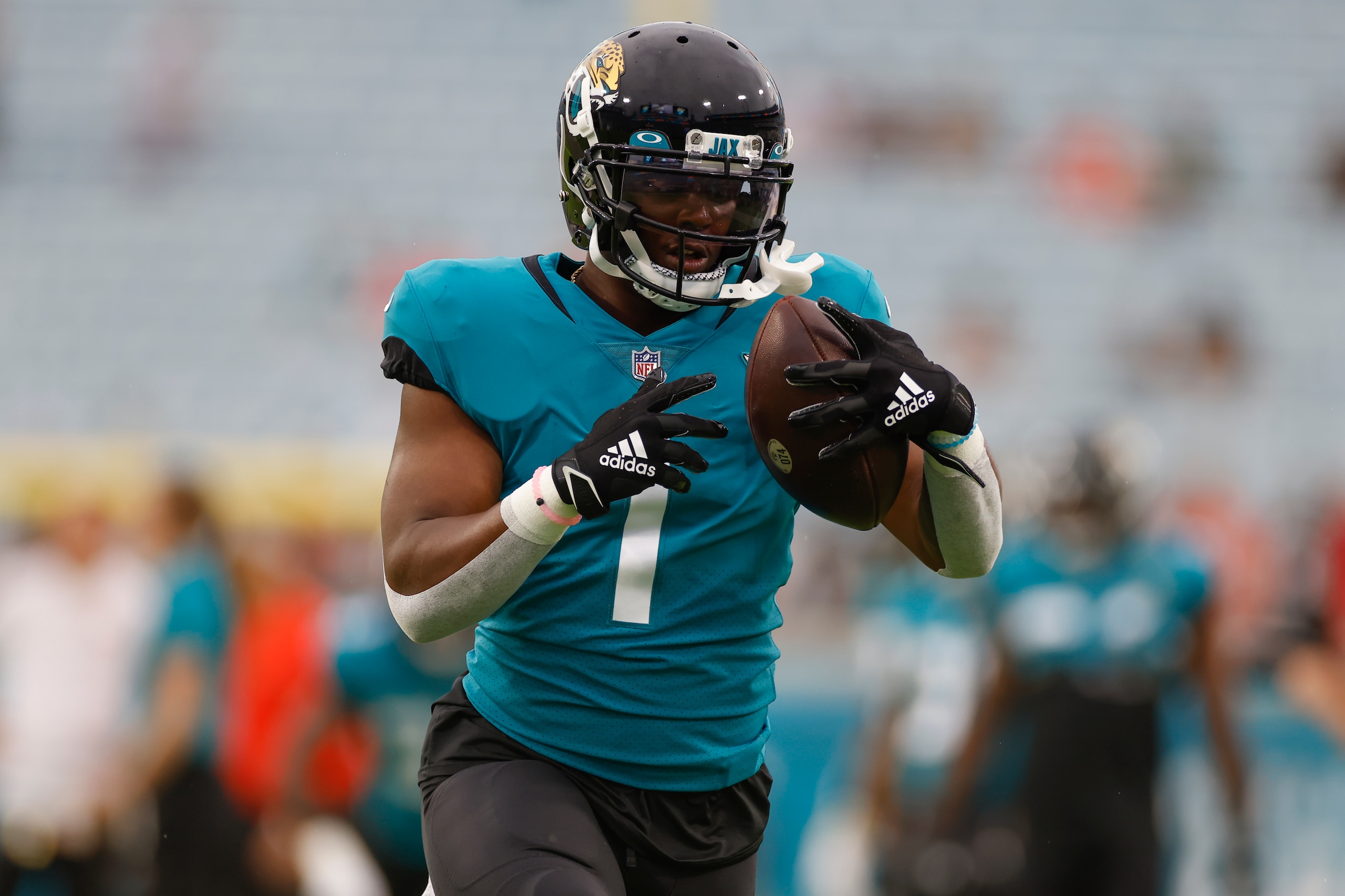 JACKSONVILLE, FL - AUGUST 14: Jacksonville Jaguars Running Back Travis Etienne Jr. (1) during the preseason game between the Cleveland Browns and the Jacksonville Jaguars on August 14, 2021 at TIAA Bank Field in Jacksonville, Fl. (Photo by David Rosenblum/Icon Sportswire via Getty Images)