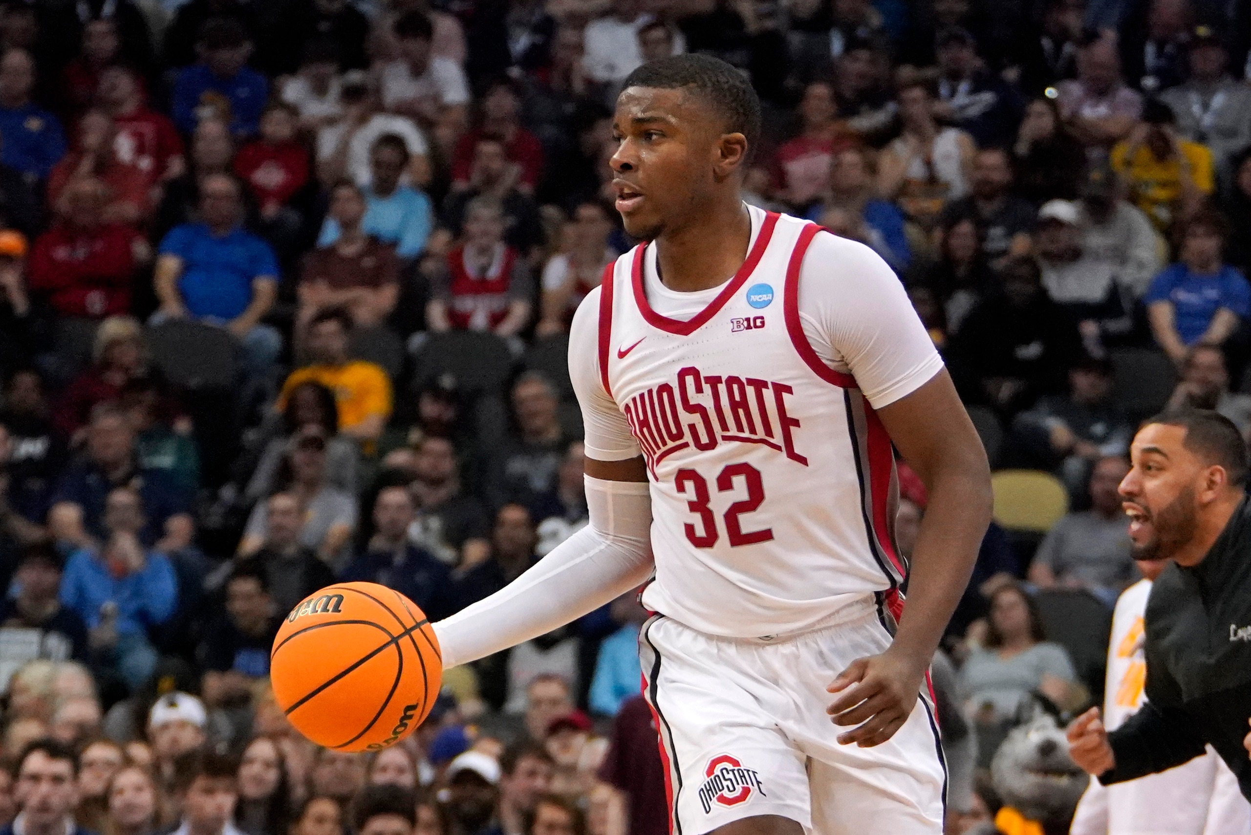 Ohio State 's E.J. Liddell (32) plays during the second half of a college basketball game Loyola Chicago in the first round of the NCAA tournament in Pittsburgh, Friday, March 18, 2022. Ohio State won 54-41. (AP Photo/Gene J. Puskar)