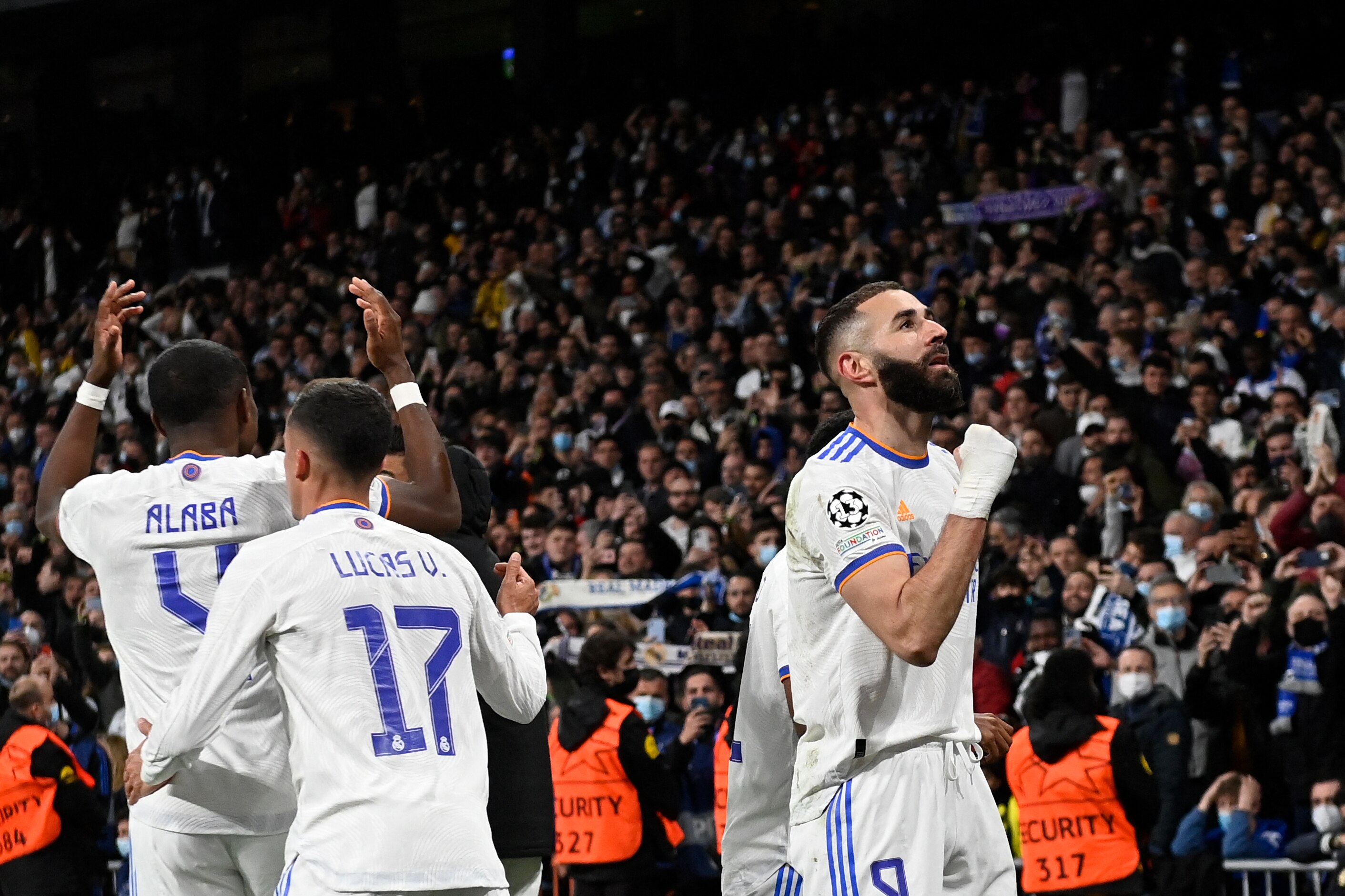 Real Madrid's French forward Karim Benzema celebrates after scoring a goal during the UEFA Champions League quarter final second leg football match between Real Madrid CF and Chelsea FC at the Santiago Bernabeu stadium in Madrid on April 12, 2022. (Photo by PIERRE-PHILIPPE MARCOU / AFP) (Photo by PIERRE-PHILIPPE MARCOU/AFP via Getty Images)