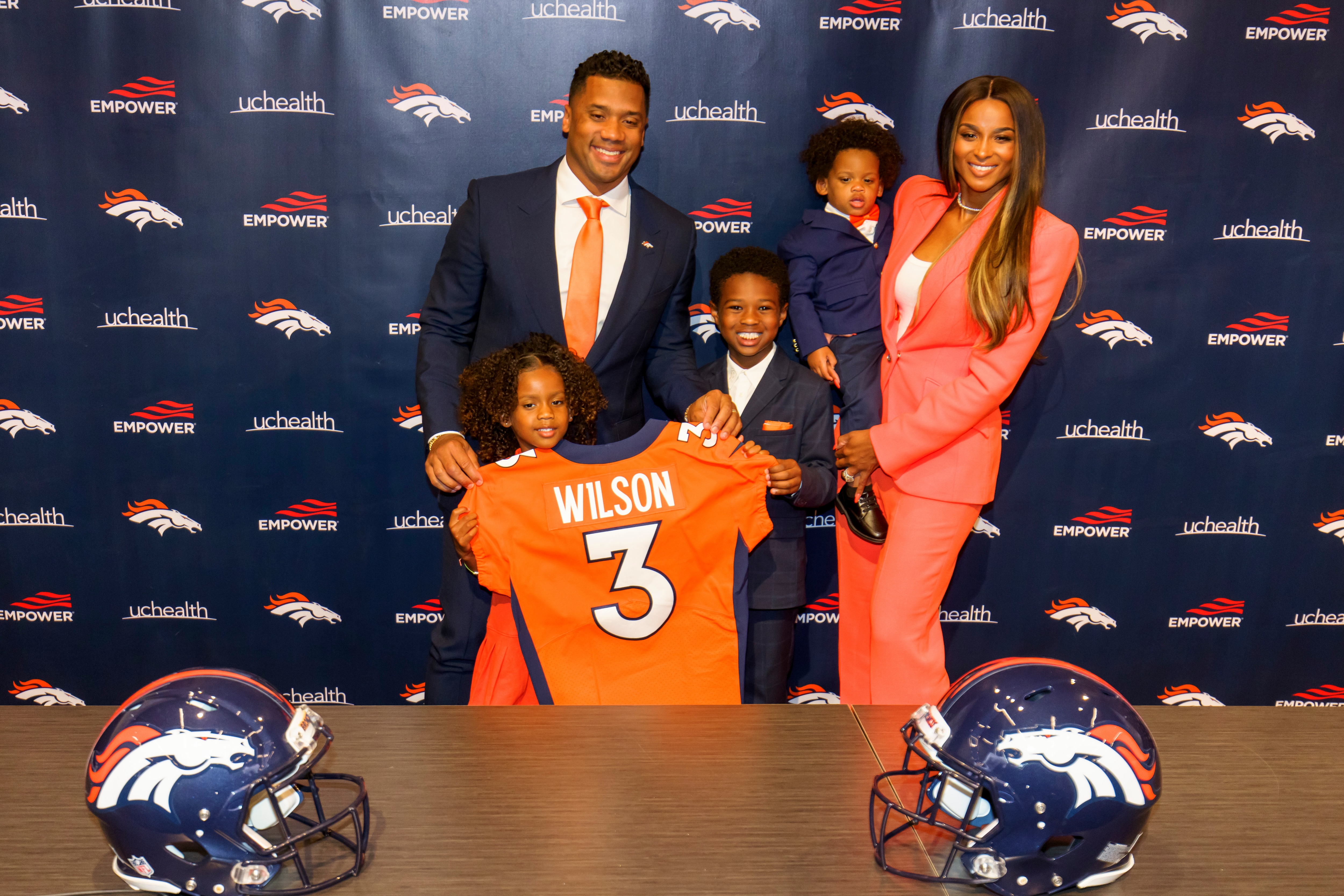 ENGLEWOOD, CO - MARCH 16:  Quarterback Russell Wilson #3 of the Denver Broncos poses with his family (L-R), Sienna, Future, Win and Ciara following an introductory press conference at UCHealth Training Center on March 16, 2022 in Englewood, Colorado. (Photo by Justin Edmonds/Getty Images)