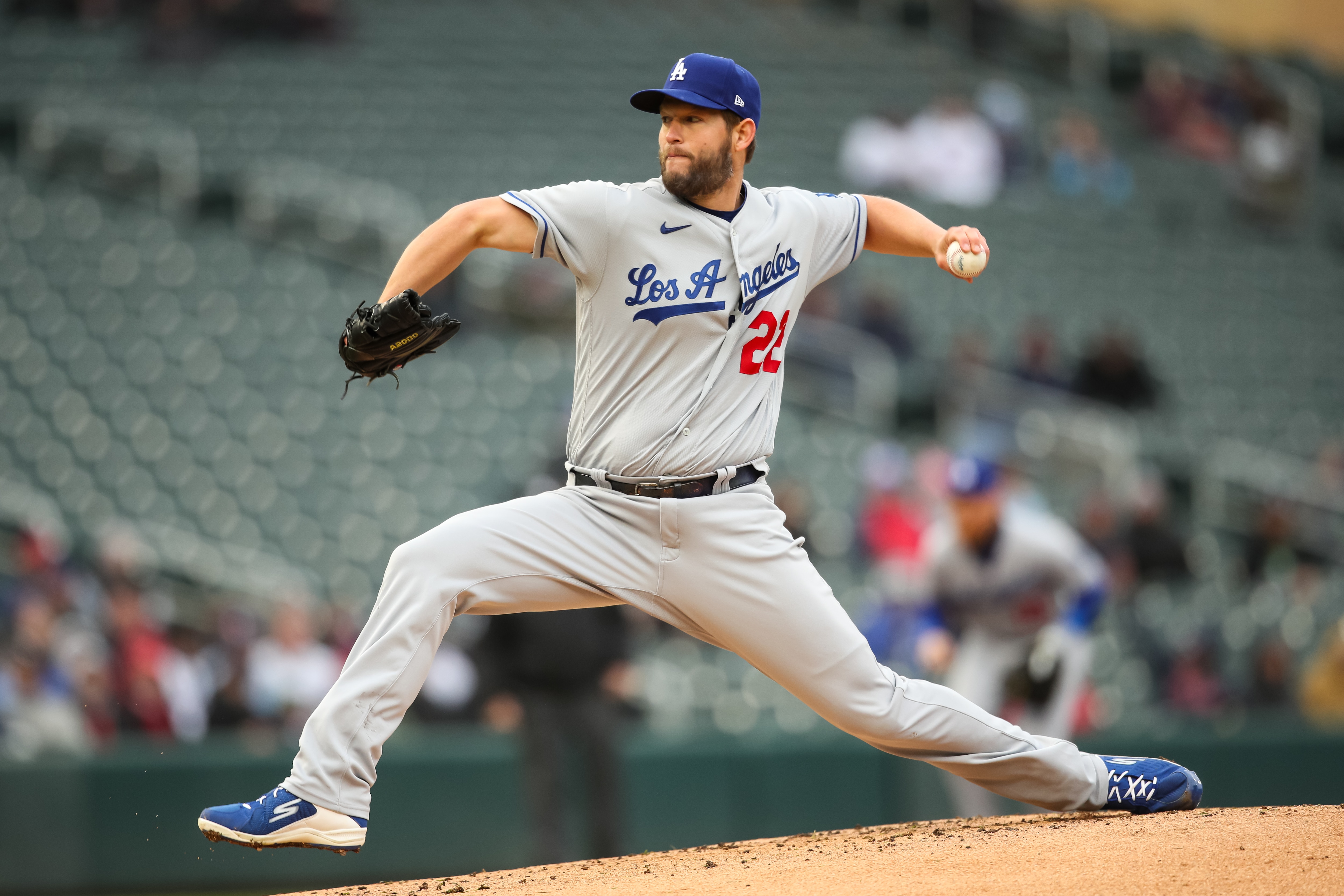 MINNEAPOLIS, MN - APRIL 13: Clayton Kershaw #22 of the Los Angeles Dodgers delivers a pitch against the Minnesota Twins in the first inning of the game at Target Field on April 13, 2022 in Minneapolis, Minnesota. (Photo by David Berding/Getty Images)