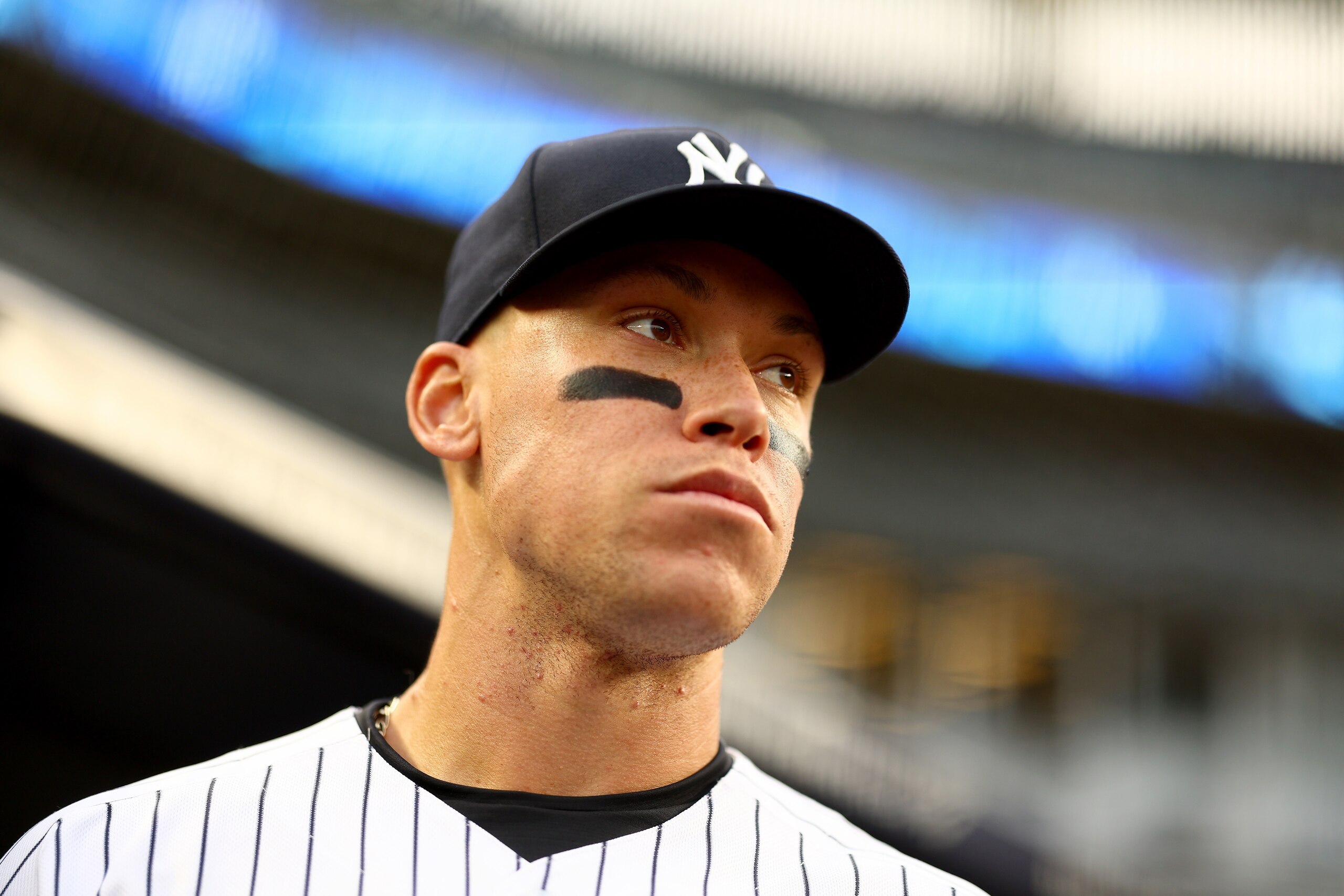 NEW YORK, NEW YORK - APRIL 11:  Aaron Judge #99 of the New York Yankees stands in the dugout before the game against the Toronto Blue Jays at Yankee Stadium on April 11, 2022 in the Bronx borough of New York City. (Photo by Elsa/Getty Images)