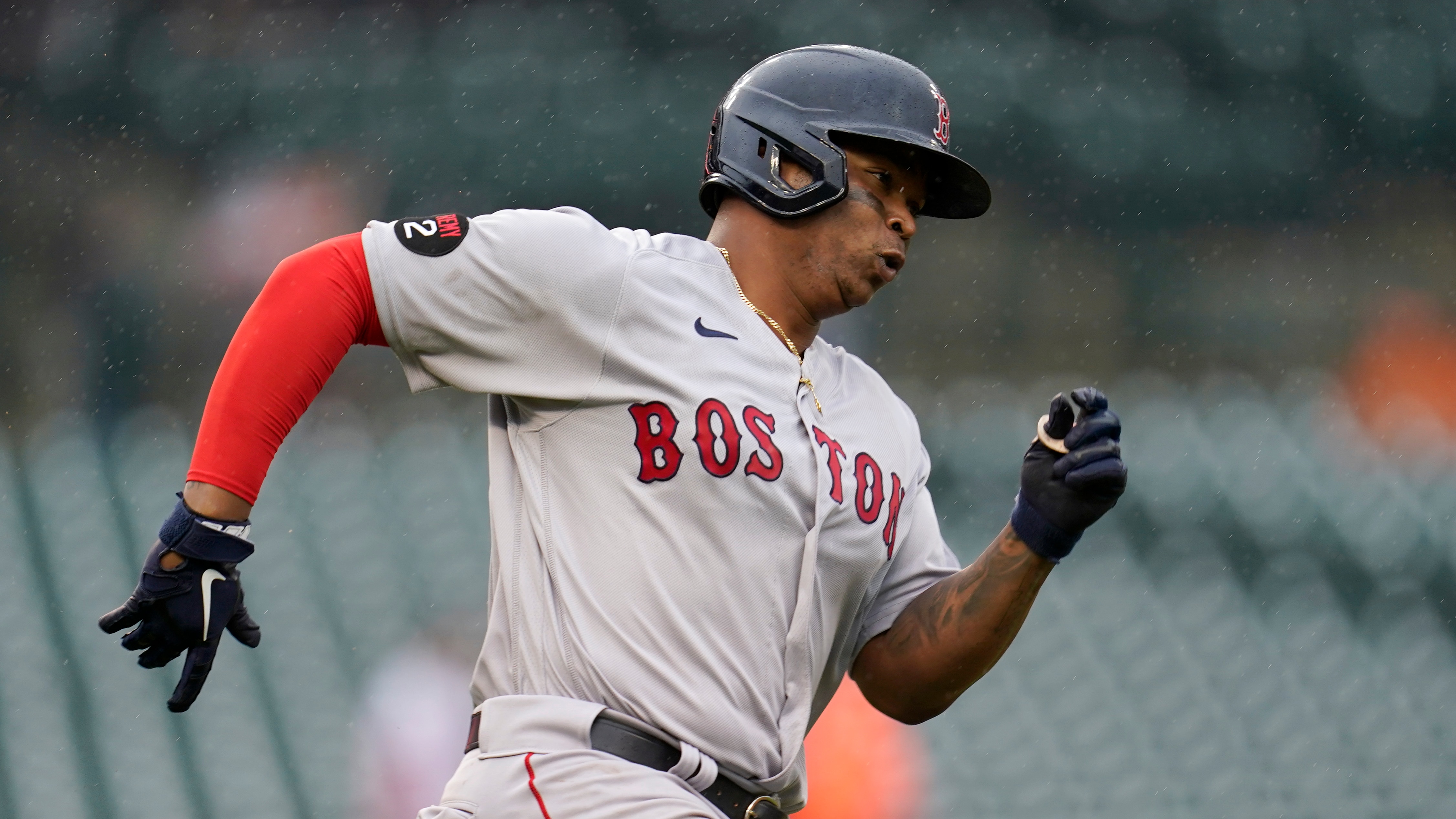 Boston Red Sox's Rafael Devers runs out a double against the Detroit Tigers in the fourth inning of a baseball game in Detroit, Wednesday, April 13, 2022. (AP Photo/Paul Sancya)