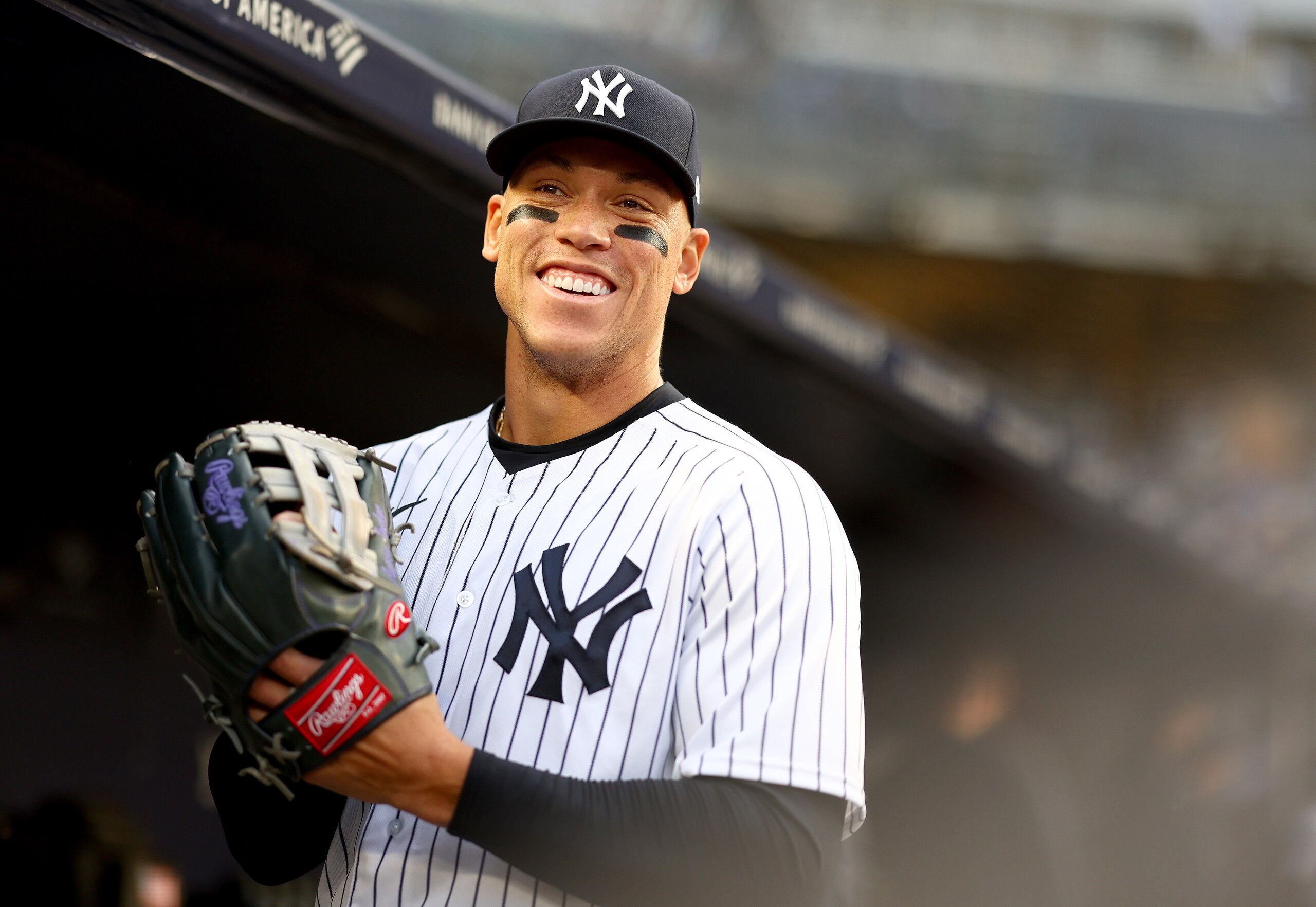 NEW YORK, NEW YORK - APRIL 11:  Aaron Judge #99 of the New York Yankees stands in the dugout before the game against the Toronto Blue Jays at Yankee Stadium on April 11, 2022 in the Bronx borough of New York City. (Photo by Elsa/Getty Images)
