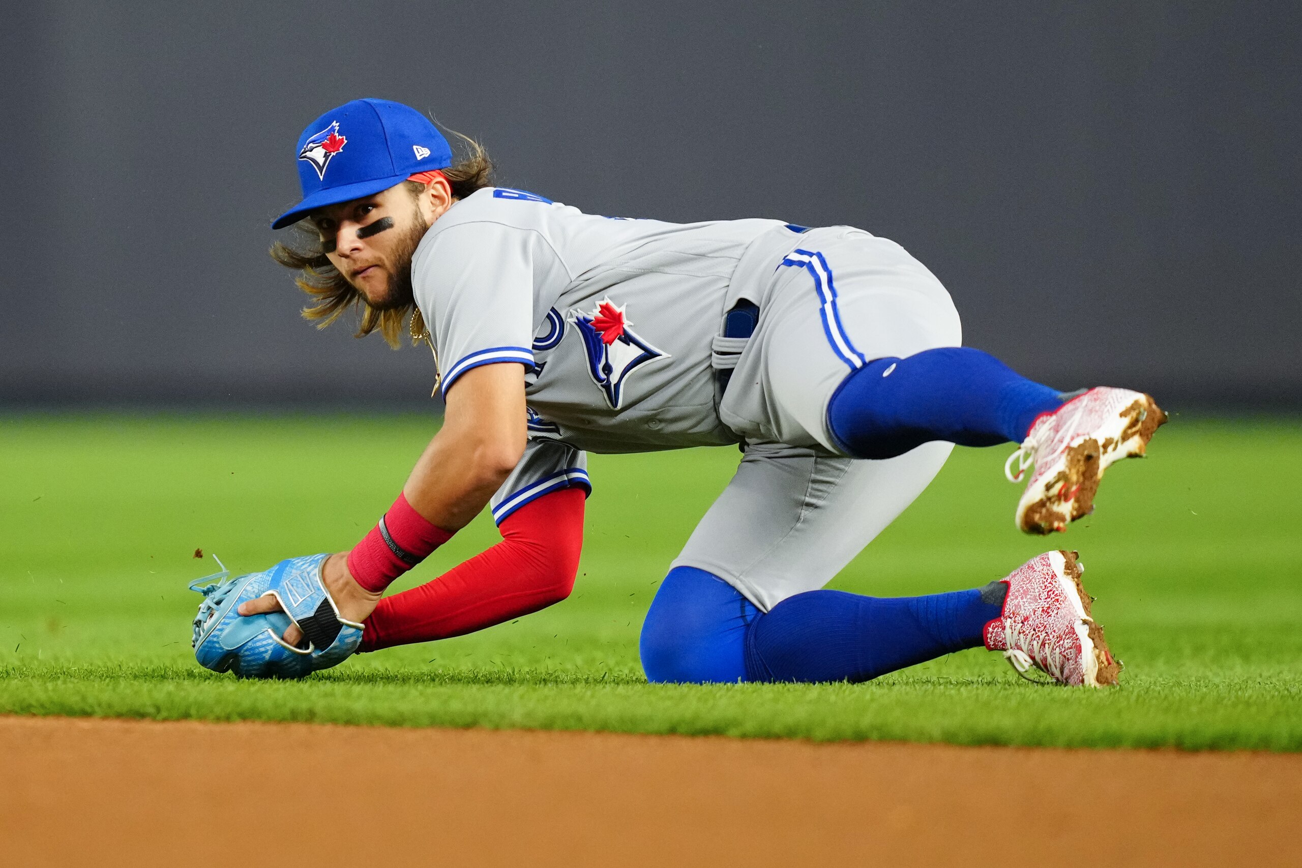 NEW YORK, NY - APRIL 13: Bo Bichette #11 of the Toronto Blue Jays fields a ball in the second inning during the game between the Toronto Blue Jays and the New York Yankees at Yankee Stadium on Wednesday, April 13, 2022 in New York, New York. (Photo by Daniel Shirey/MLB Photos via Getty Images)