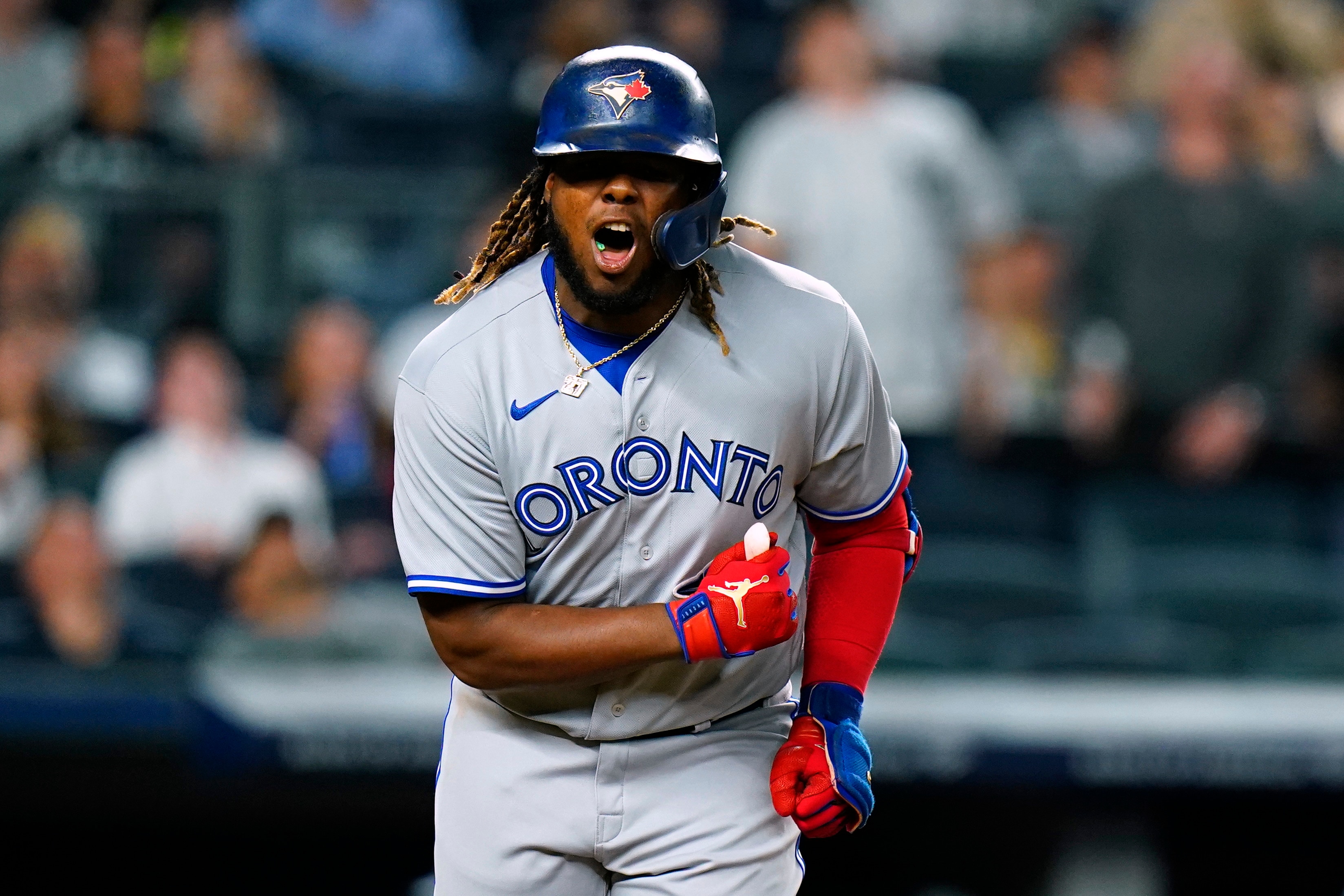 Toronto Blue Jays' Vladimir Guerrero Jr. reacts after popping up for an out during the sixth inning of the team's baseball game against the New York Yankees on Tuesday, April 12, 2022, in New York. (AP Photo/Frank Franklin II)