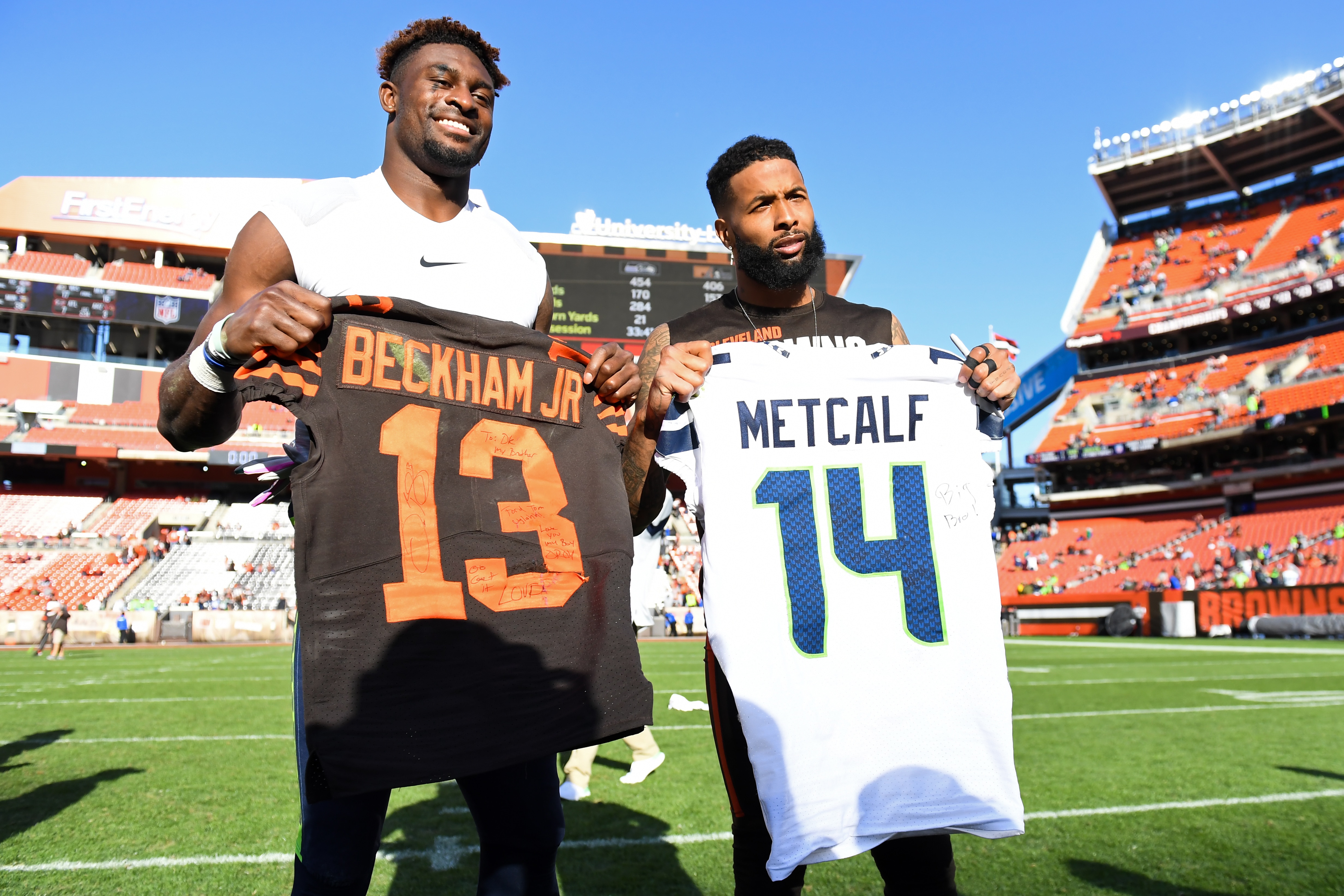 CLEVELAND, OH - OCTOBER 13, 2019: Wide receivers DK Metcalf #14 of the Seattle Seahawks and Odell Beckham Jr. #13 of the Cleveland Browns pose for a picture after trading jersys after a game on October 13, 2019 at FirstEnergy Stadium in Cleveland, Ohio. Seattle won 32-28. (Photo by: 2019 Nick Cammett/Diamond Images via Getty Images)
