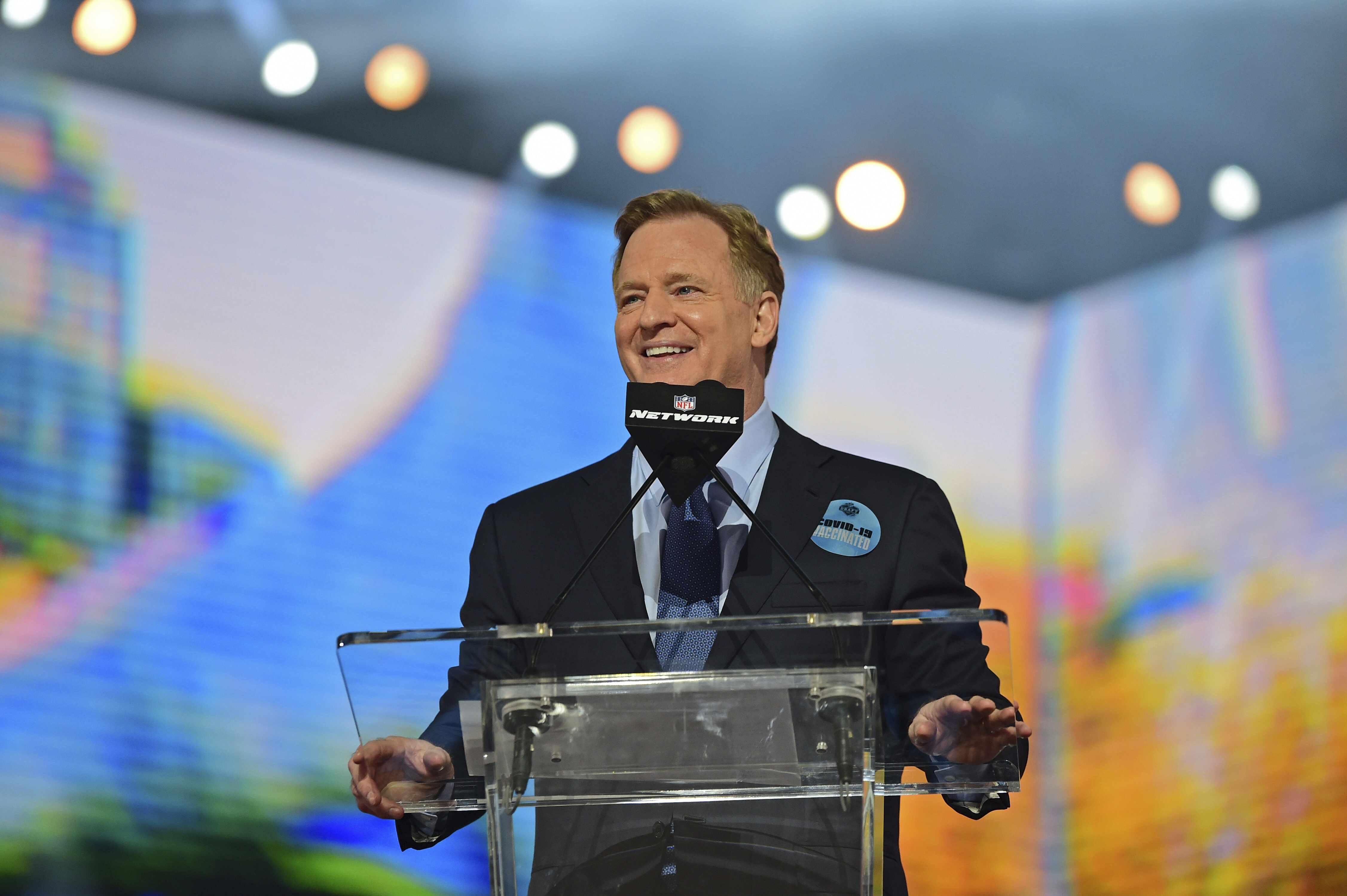 NFL commissioner Roger Goodell talks to the crowd at the start of the first round of the NFL football draft Thursday, April 29, 2021, in Cleveland. (AP Photo/David Dermer)