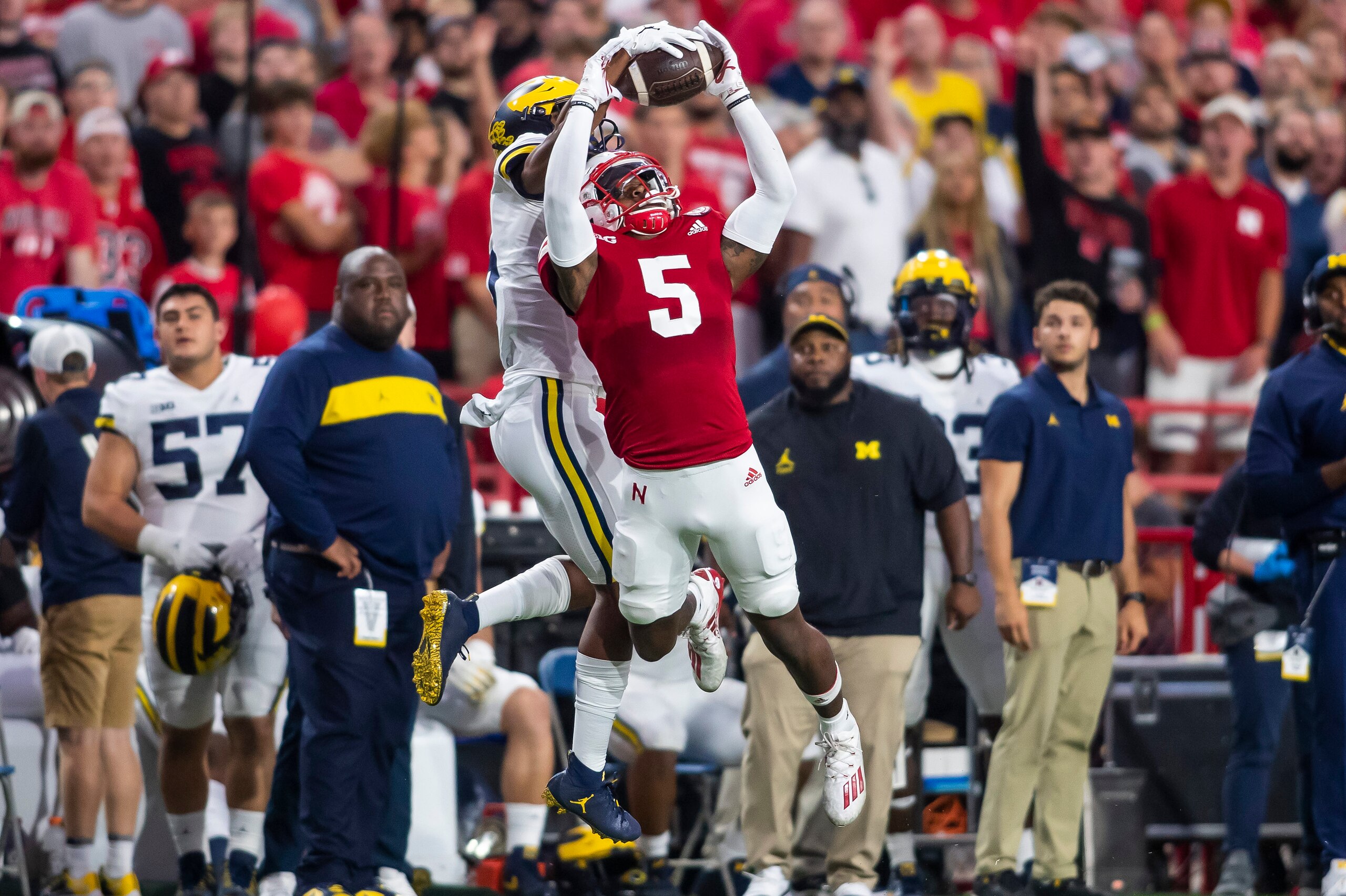 LINCOLN, NE - OCTOBER 09: Nebraska Cornhuskers cornerback Cam Taylor-Britt (5) breaks up a pass to Michigan Wolverines wide receiver Cornelius Johnson (6) during the game between the Nebraska Cornhuskers and the Michigan Wolverines on Saturday October 9th, 2021 at Memorial Stadium in Lincoln, NE. (Photo by Nick Tre. Smith/Icon Sportswire via Getty Images) LINCOLN, NE - OCTOBER 09: Nebraska Cornhuskers cornerback Cam Taylor-Britt (5) breaks up a pass to Michigan Wolverines wide receiver Cornelius Johnson (6) during the game between the Nebraska Cornhuskers and the Michigan Wolverines on Saturday October 9th, 2021 at Memorial Stadium in Lincoln, NE. (Photo by Nick Tre. Smith/Icon Sportswire via Getty Images)
