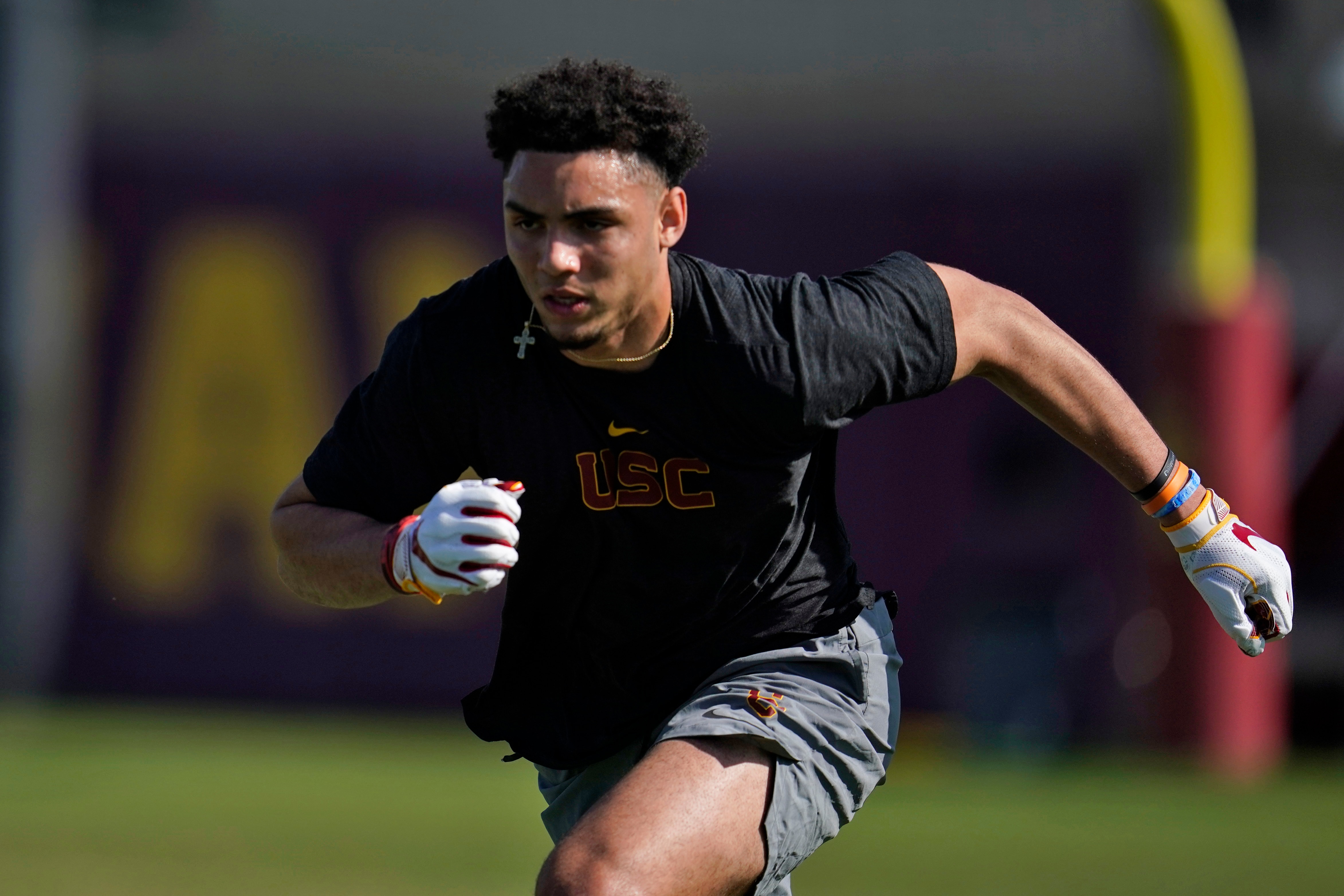 Wide receiver Drake London runs a football drill during Southern California NFL Pro Day Friday, April 15, 2022, in Los Angeles. (AP Photo/Marcio Jose Sanchez)