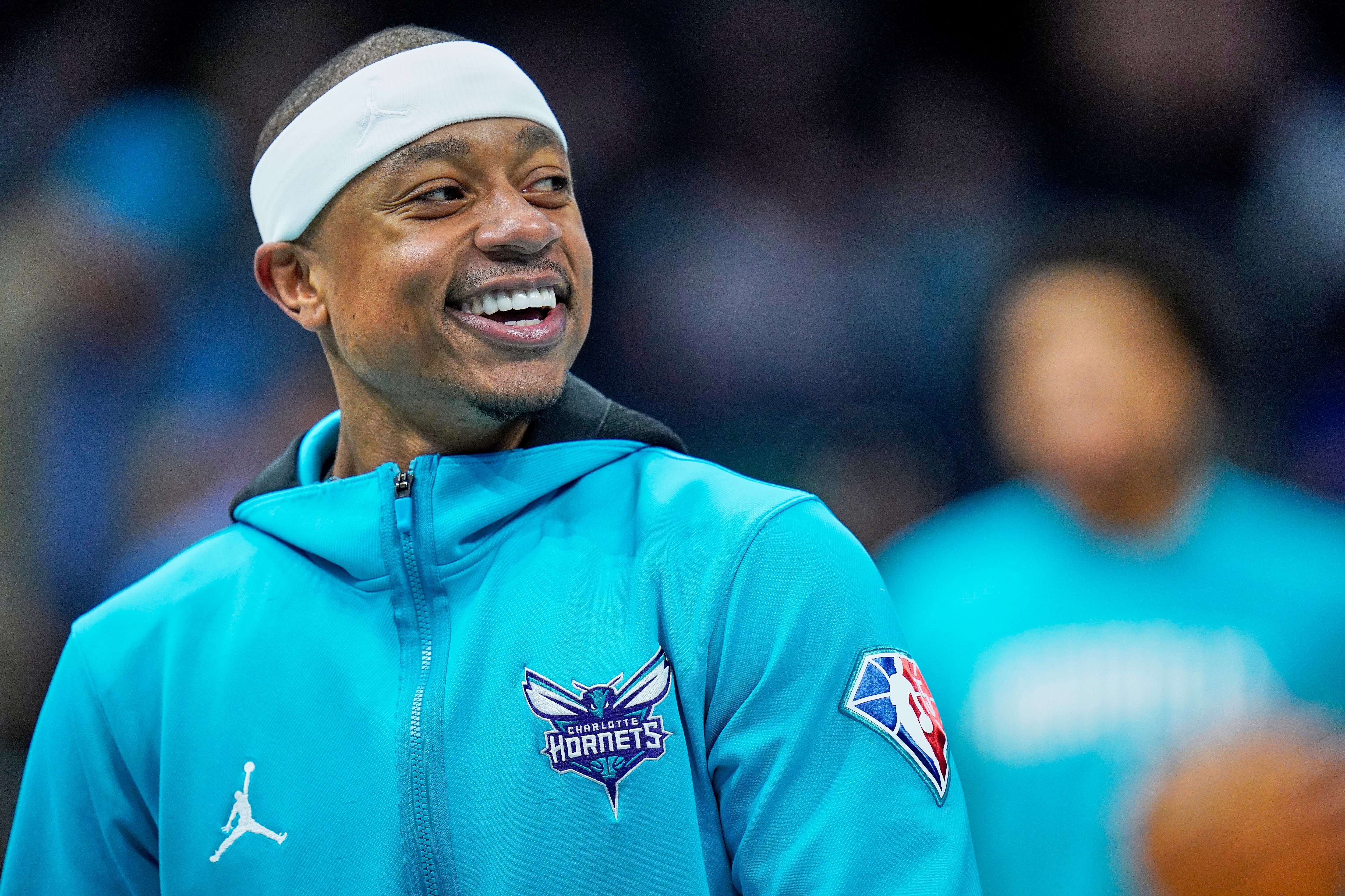 Charlotte Hornets guard Isaiah Thomas smiles during warm ups at an NBA basketball game against the Washington Wizards on Sunday, April 10, 2022, in Charlotte, N.C. (AP Photo/Rusty Jones)