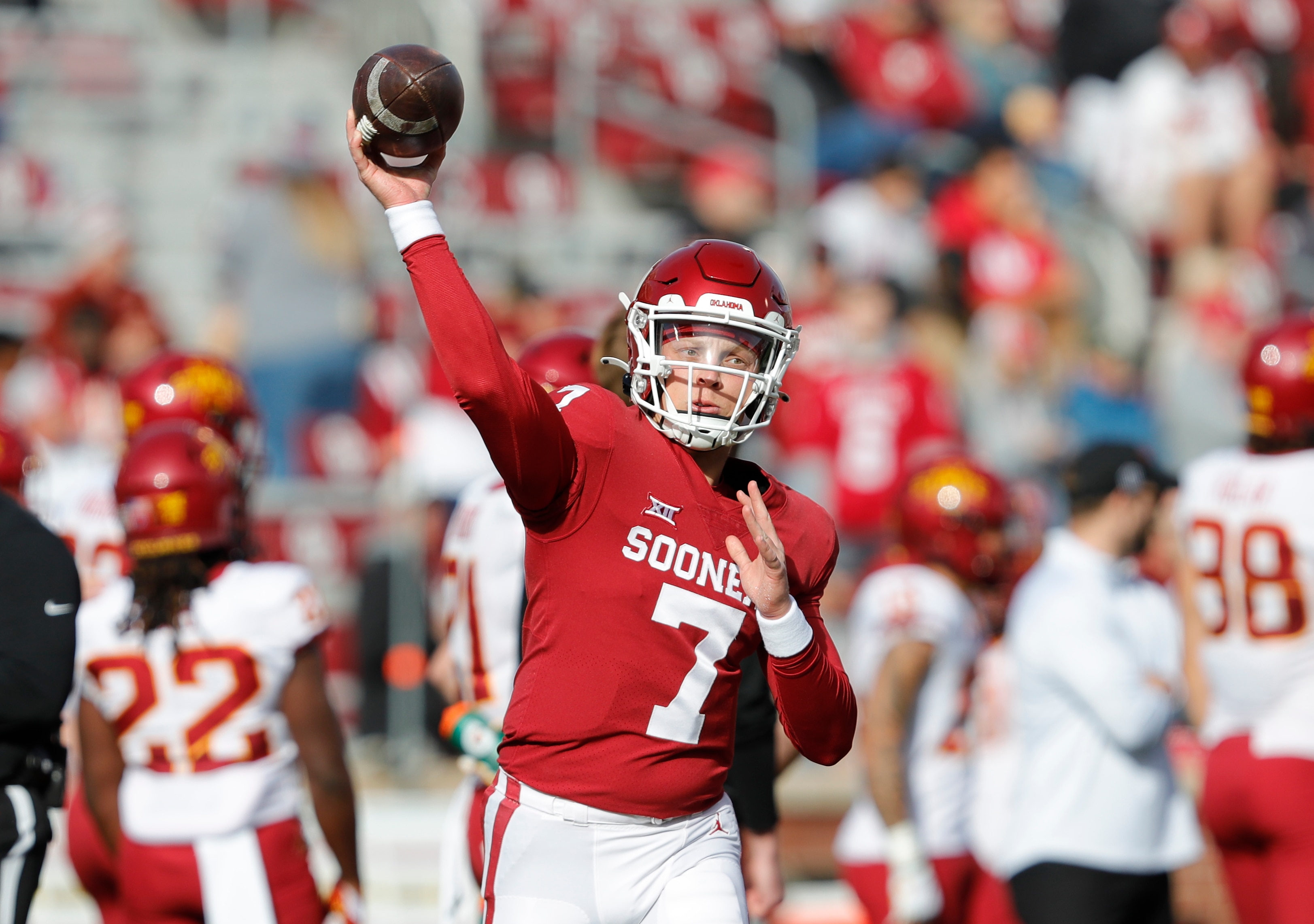 Oklahoma quarterback Spencer Rattler (7) warms up before the start of an NCAA college football game against Iowa State on Saturday, Nov. 20, 2021, in Norman, Okla. (AP Photo/Alonzo Adams)