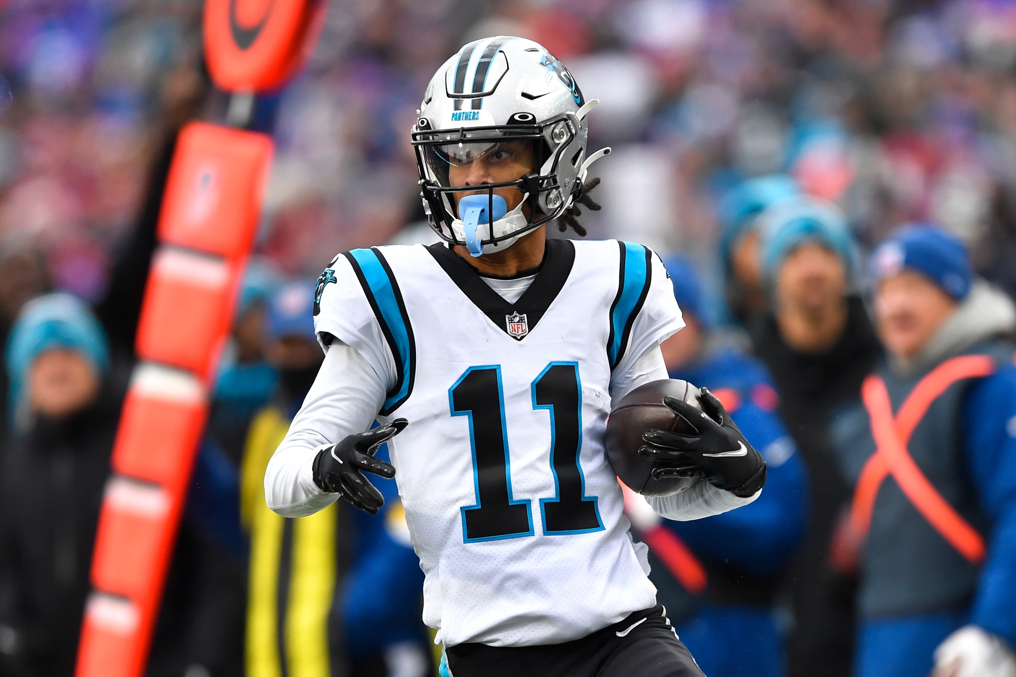 Carolina Panthers wide receiver Robby Anderson (11) runs the ball in the first half of an NFL football game against the Buffalo Bills, Sunday, Dec. 19, 2021, in Orchard Park, N.Y. (AP Photo/Adrian Kraus)