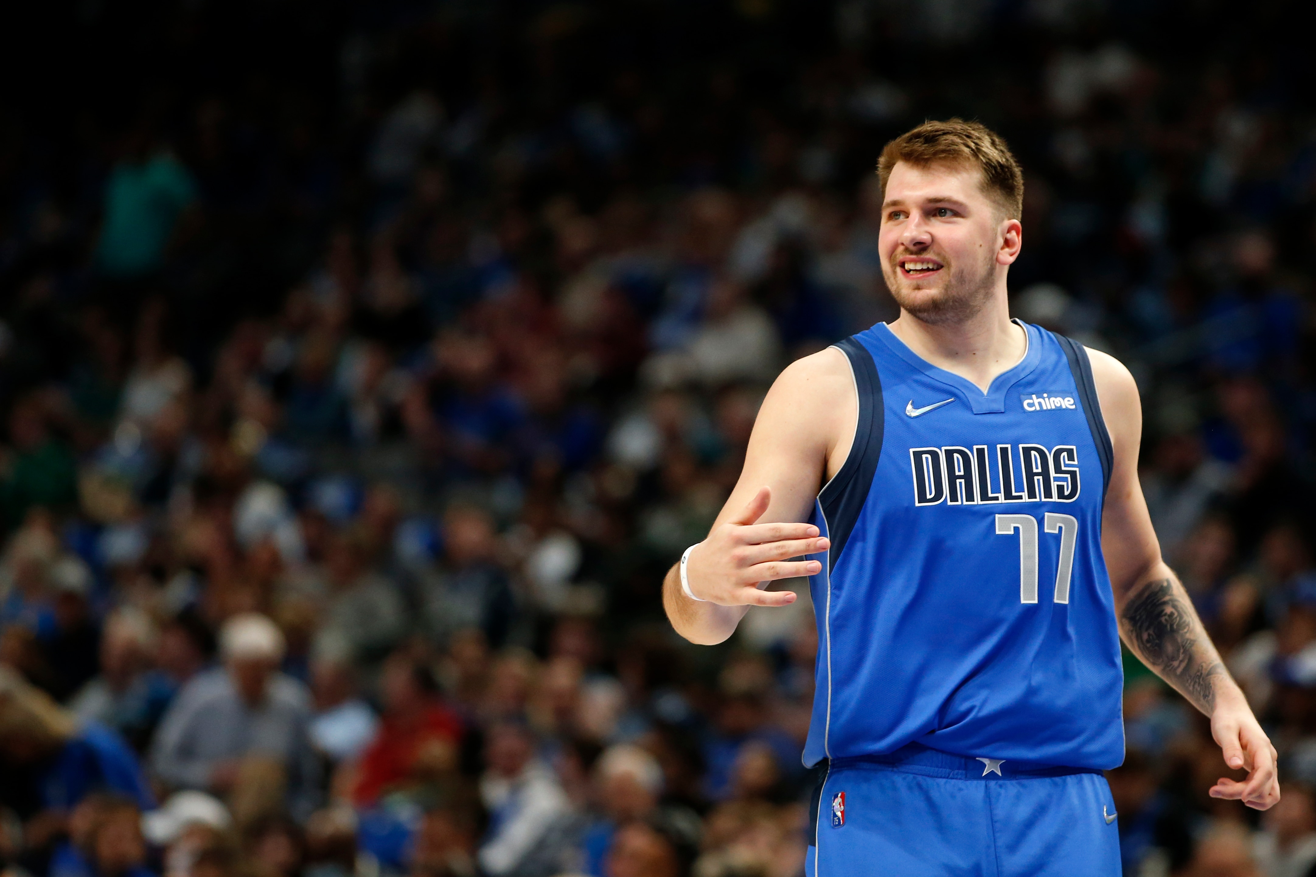 DALLAS, TEXAS - APRIL 10: Luka Doncic #77 of the Dallas Mavericks reacts during the game against the San Antonio Spurs at American Airlines Center on April 10, 2022 in Dallas, Texas. NOTE TO USER: User expressly acknowledges and agrees that, by downloading and or using this photograph, User is consenting to the terms and conditions of the Getty Images License Agreement.  (Photo by Tim Heitman/Getty Images)