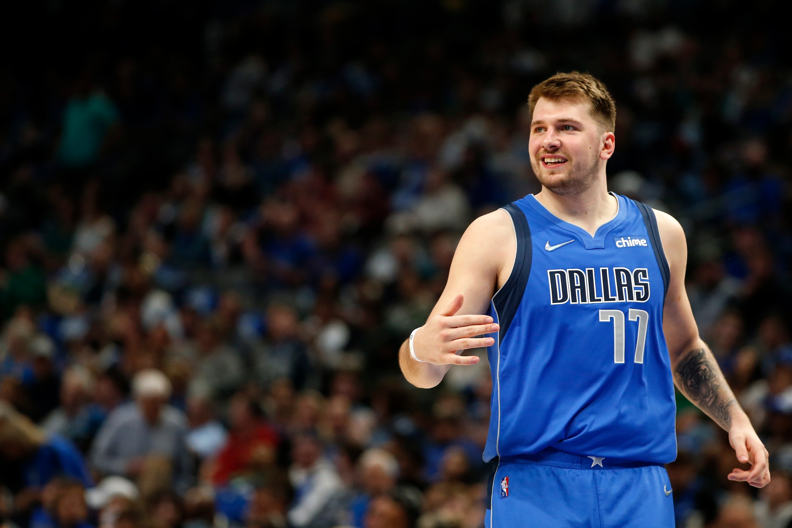 DALLAS, TEXAS - APRIL 10: Luka Doncic #77 of the Dallas Mavericks reacts during the game against the San Antonio Spurs at American Airlines Center on April 10, 2022 in Dallas, Texas. NOTE TO USER: User expressly acknowledges and agrees that, by downloading and or using this photograph, User is consenting to the terms and conditions of the Getty Images License Agreement.  (Photo by Tim Heitman/Getty Images)