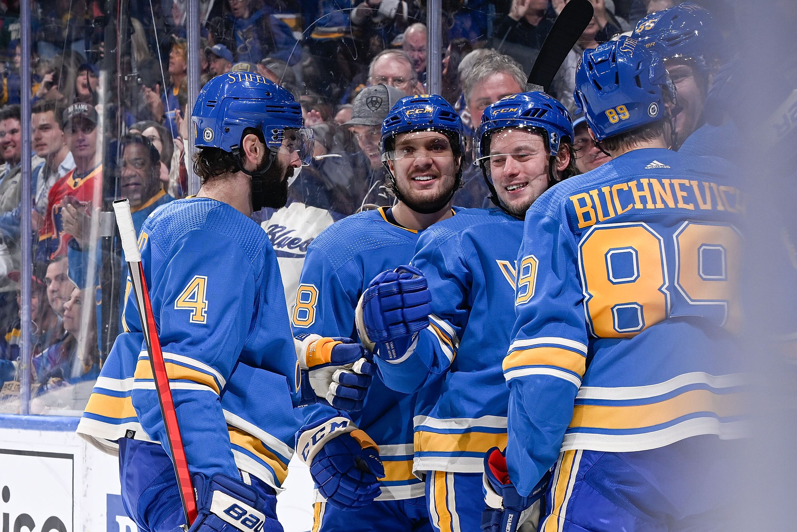 ST. LOUIS, MO - APRIL 16: Vladimir Tarasenko #91 of the St. Louis Blues is congratulated after scoring a goal against the Minnesota Wild at the Enterprise Center on April 16, 2022 in St. Louis, Missouri. (Photo by Scott Rovak/NHLI via Getty Images)