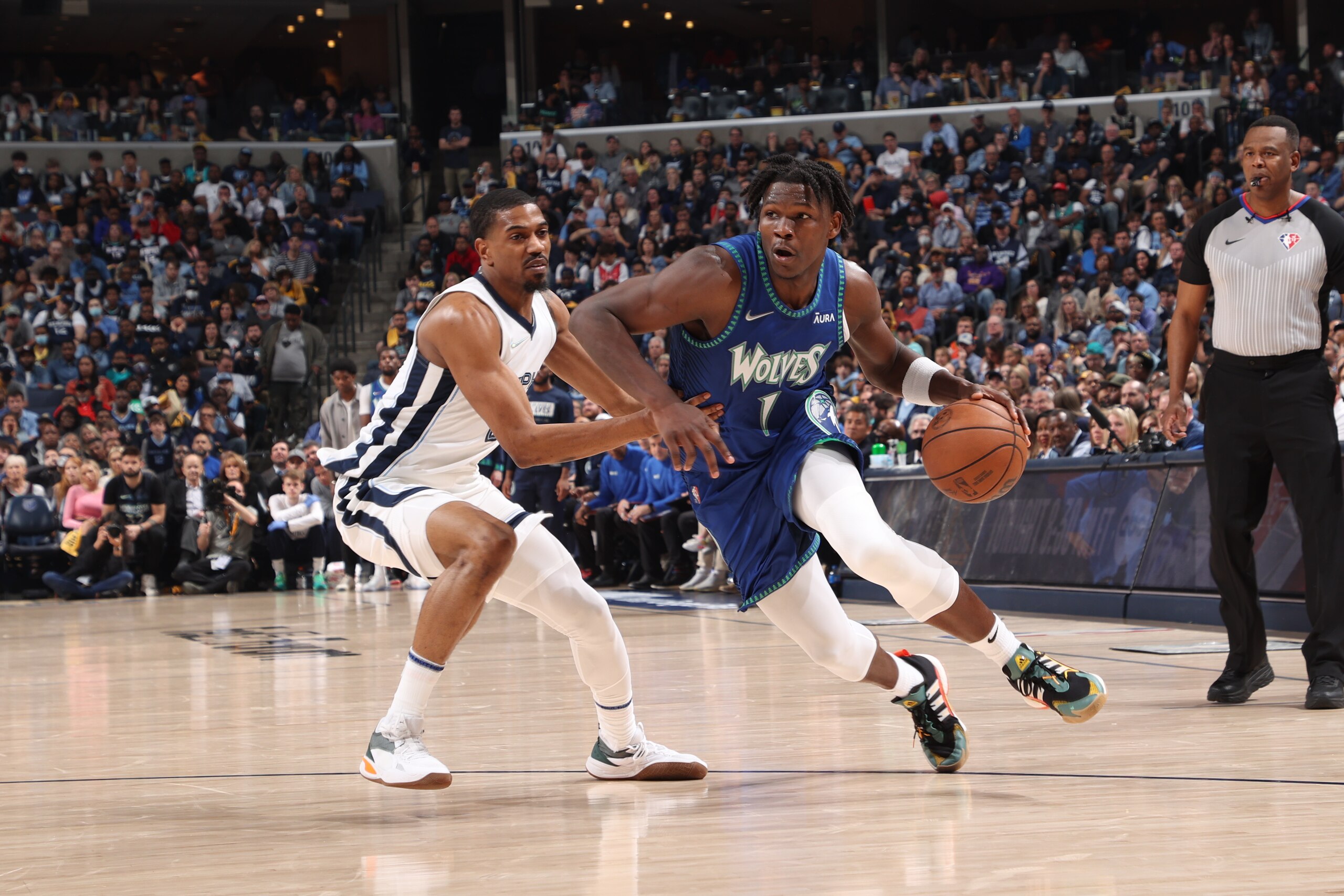 MEMPHIS, TN - APRIL 16: Anthony Edwards #1 of the Minnesota Timberwolves drives to the basket against the Memphis Grizzlies during Round 1 Game 1 of the 2022 NBA Playoffs on April 16, 2022 at FedExForum in Memphis, Tennessee. NOTE TO USER: User expressly acknowledges and agrees that, by downloading and or using this photograph, User is consenting to the terms and conditions of the Getty Images License Agreement. Mandatory Copyright Notice: Copyright 2022 NBAE (Photo by Joe Murphy/NBAE via Getty Images)