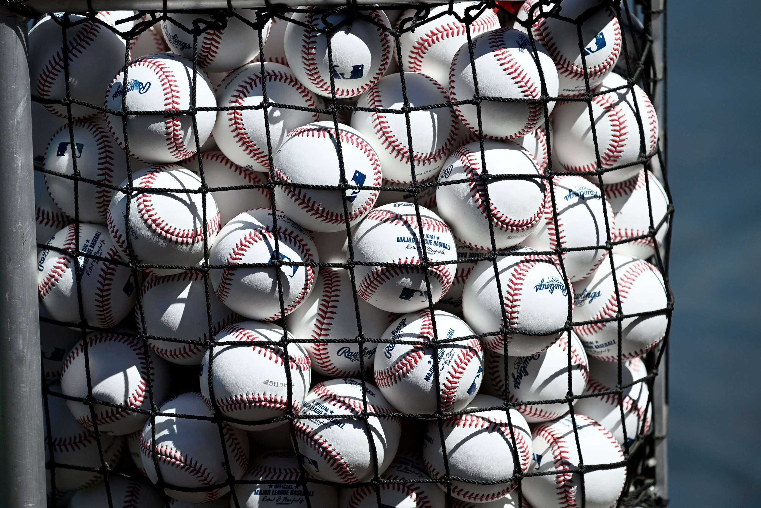 SAN DIEGO, CA - APRIL 14: A general view of baseballs on the field on Opening Day before a baseball game between the Atlanta Braves and the San Diego Padres on April 14, 2022 in San Diego, California.  (Photo by Denis Poroy/Getty Images)