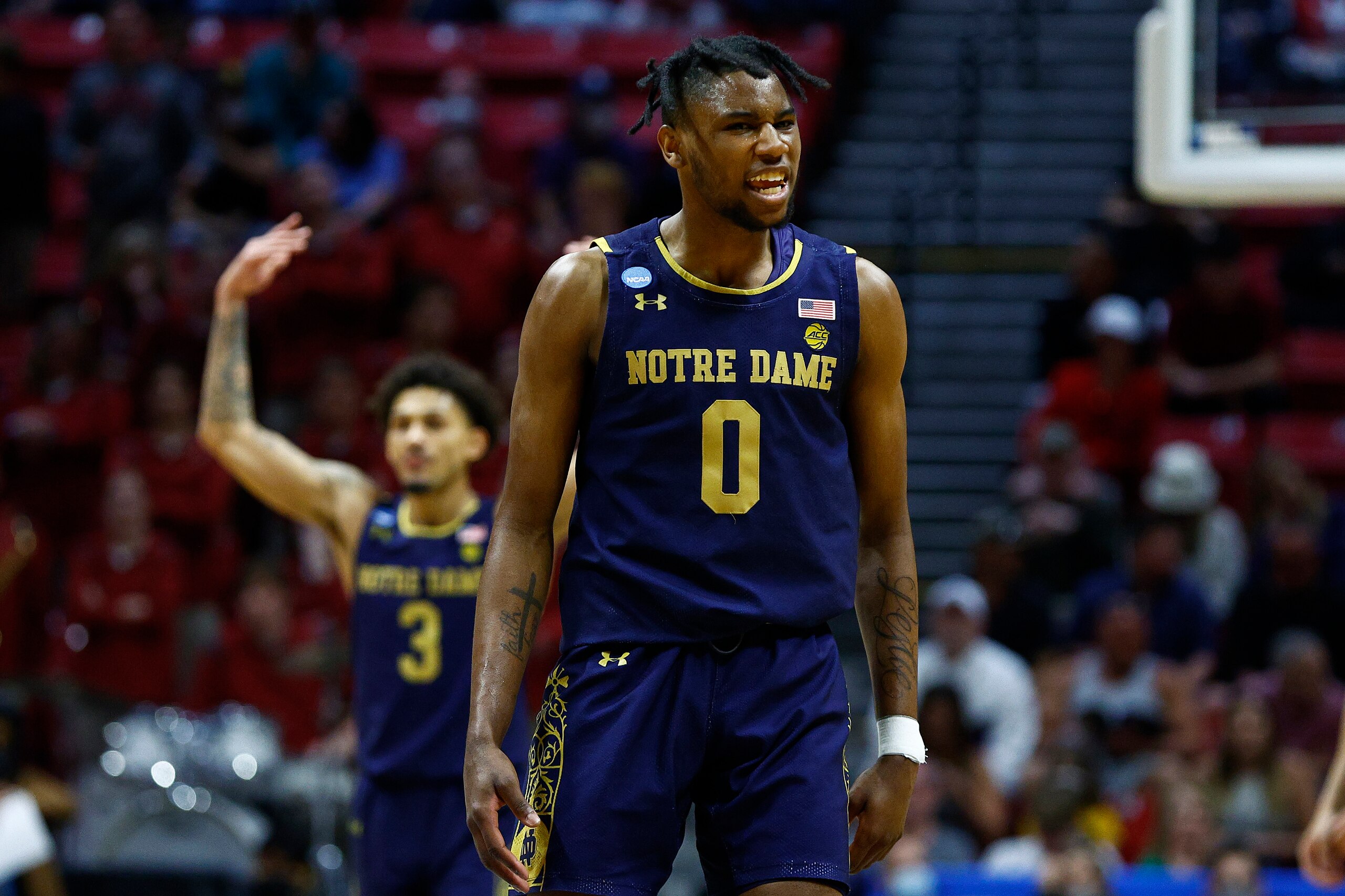 SAN DIEGO, CALIFORNIA - MARCH 18: Blake Wesley #0 of the Notre Dame Fighting Irish celebrates against the Alabama Crimson Tide during the second half in the first round game of the 2022 NCAA Men's Basketball Tournament at Viejas Arena at San Diego State University on March 18, 2022 in San Diego, California. (Photo by Ronald Martinez/Getty Images)