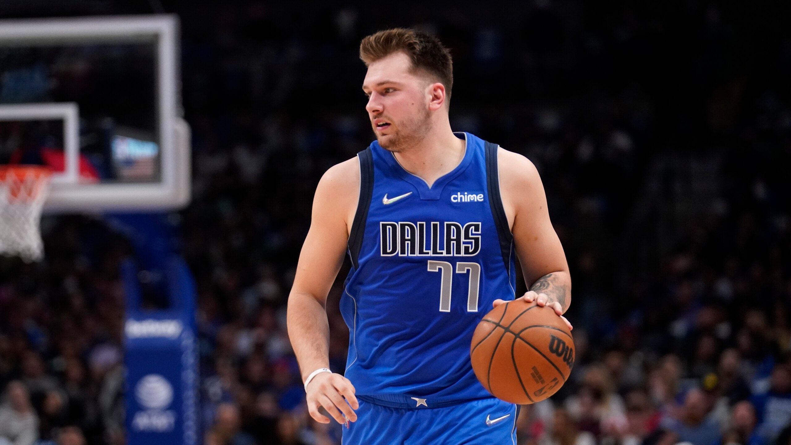Dallas Mavericks guard Luka Doncic works against the San Antonio Spurs during an NBA basketball game, Sunday, April 10, 2022, in Dallas. (AP Photo/Tony Gutierrez)