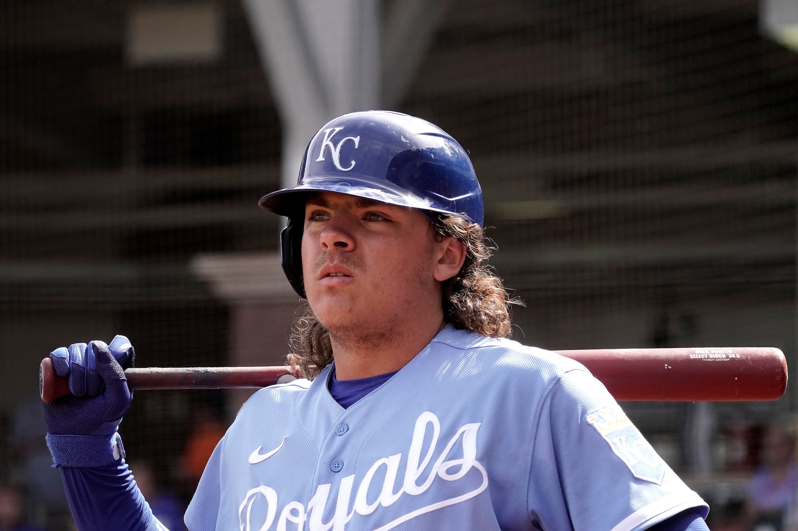 Kansas City Royals' Nick Pratto waits to bat during the third inning of a spring training baseball game Friday, March 25, 2022, in Surprise, Ariz. (AP Photo/Charlie Riedel)