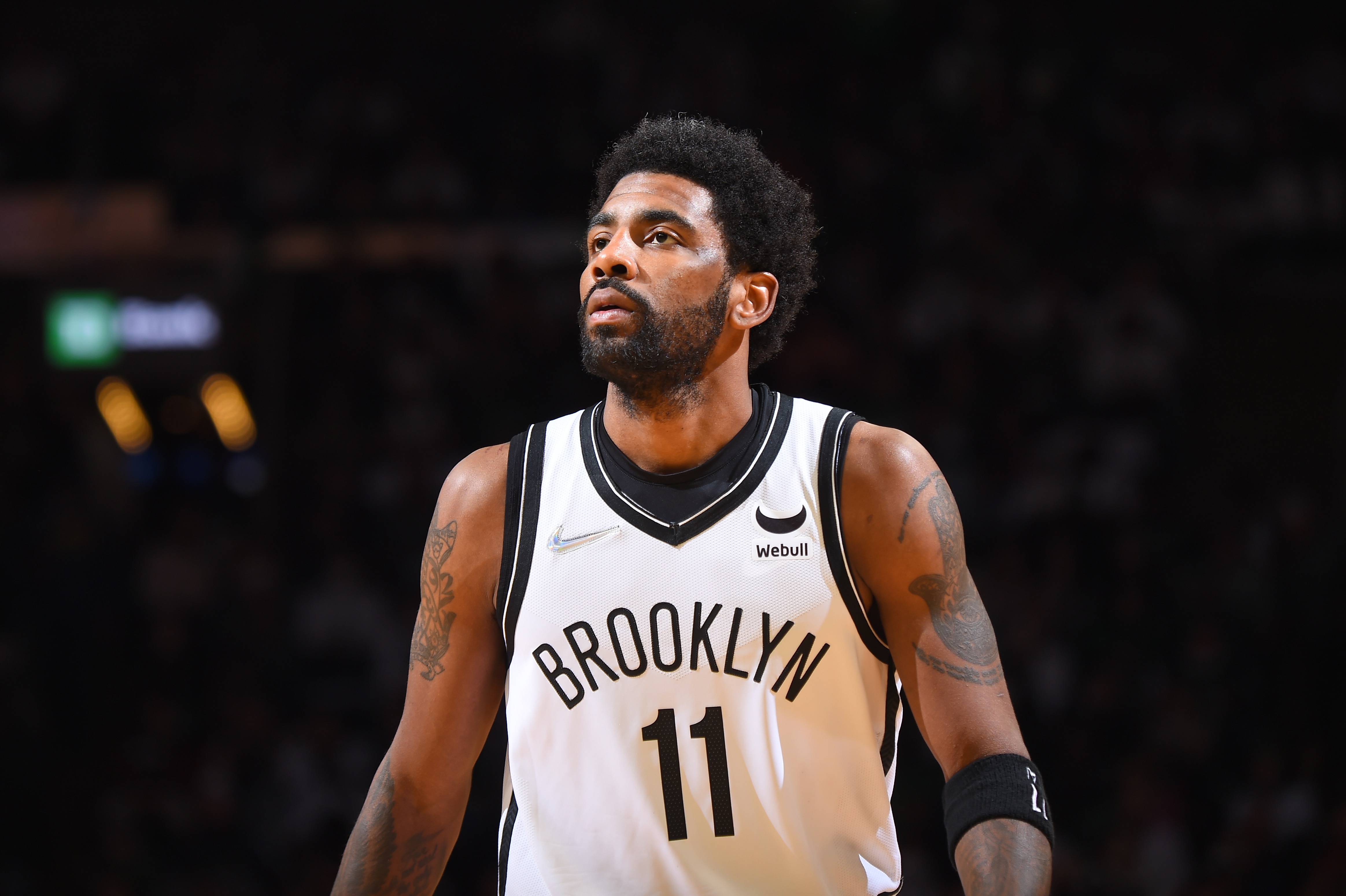 BOSTON, MA - APRIL 17: Kyrie Irving #11 of the Brooklyn Nets looks on during Round 1 Game 1 of the 2022 NBA Playoffs on April 17, 2022 at the TD Garden in Boston, Massachusetts.  NOTE TO USER: User expressly acknowledges and agrees that, by downloading and or using this photograph, User is consenting to the terms and conditions of the Getty Images License Agreement. Mandatory Copyright Notice: Copyright 2022 NBAE  (Photo by Brian Babineau/NBAE via Getty Images)
