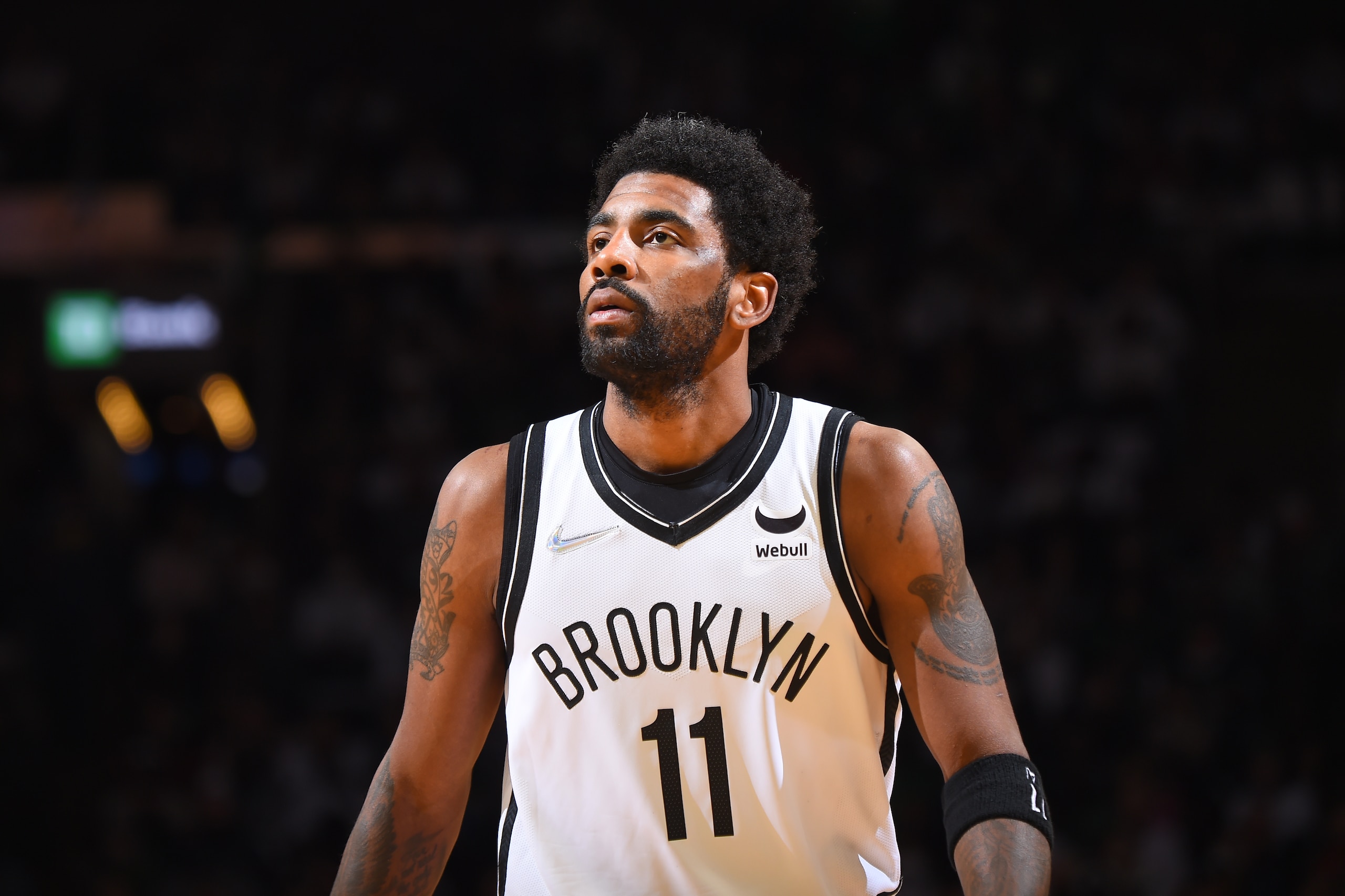 BOSTON, MA - APRIL 17: Kyrie Irving #11 of the Brooklyn Nets looks on during Round 1 Game 1 of the 2022 NBA Playoffs on April 17, 2022 at the TD Garden in Boston, Massachusetts.  NOTE TO USER: User expressly acknowledges and agrees that, by downloading and or using this photograph, User is consenting to the terms and conditions of the Getty Images License Agreement. Mandatory Copyright Notice: Copyright 2022 NBAE  (Photo by Brian Babineau/NBAE via Getty Images)