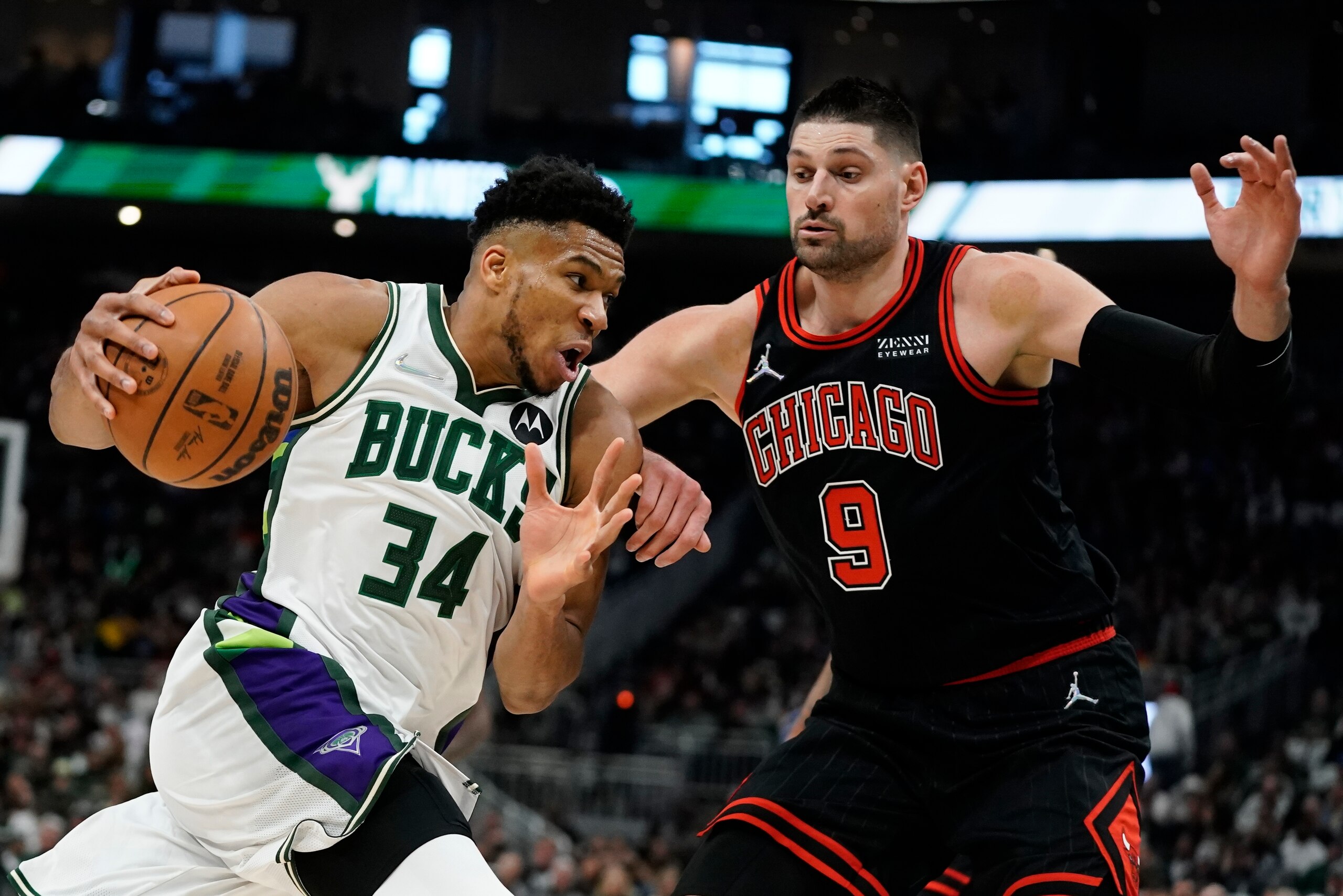 Milwaukee Bucks' Giannis Antetokounmpo tries to get past Chicago Bulls' Nikola Vucevic during the first half of Game 1 of their first round NBA playoff basketball game Sunday, April 17, 2022, in Milwaukee. (AP Photo/Morry Gash) Milwaukee Bucks' Giannis Antetokounmpo tries to get past Chicago Bulls' Nikola Vucevic during the first half of Game 1 of their first round NBA playoff basketball game Sunday, April 17, 2022, in Milwaukee. (AP Photo/Morry Gash)