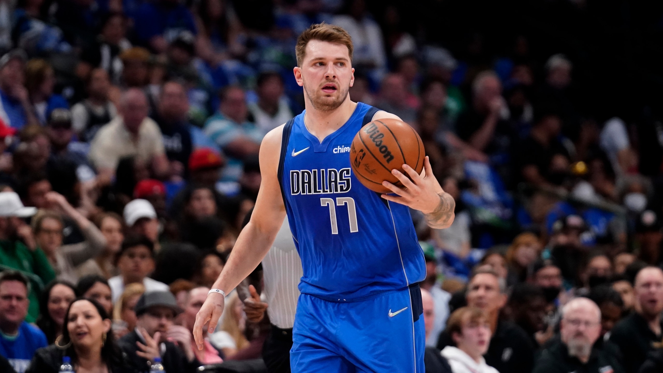 Dallas Mavericks guard Luka Doncic works against the San Antonio Spurs during an NBA basketball game, Sunday, April 10, 2022, in Dallas. (AP Photo/Tony Gutierrez)