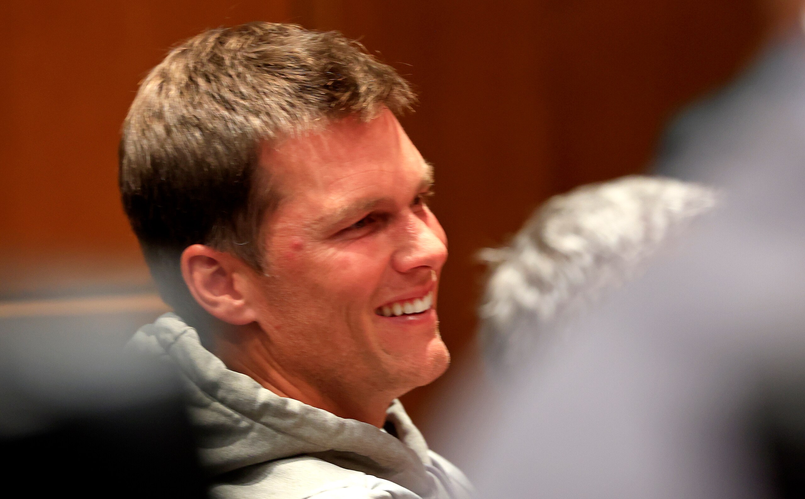 TAMPA, FLORIDA - MARCH 31: Tom Brady, quarterback for the Tampa Bay Buccaneers looks on during a press conference for new head coach Todd Bowles at AdventHealth Training Center on March 31, 2022 in Tampa, Florida. (Photo by Mike Ehrmann/Getty Images)