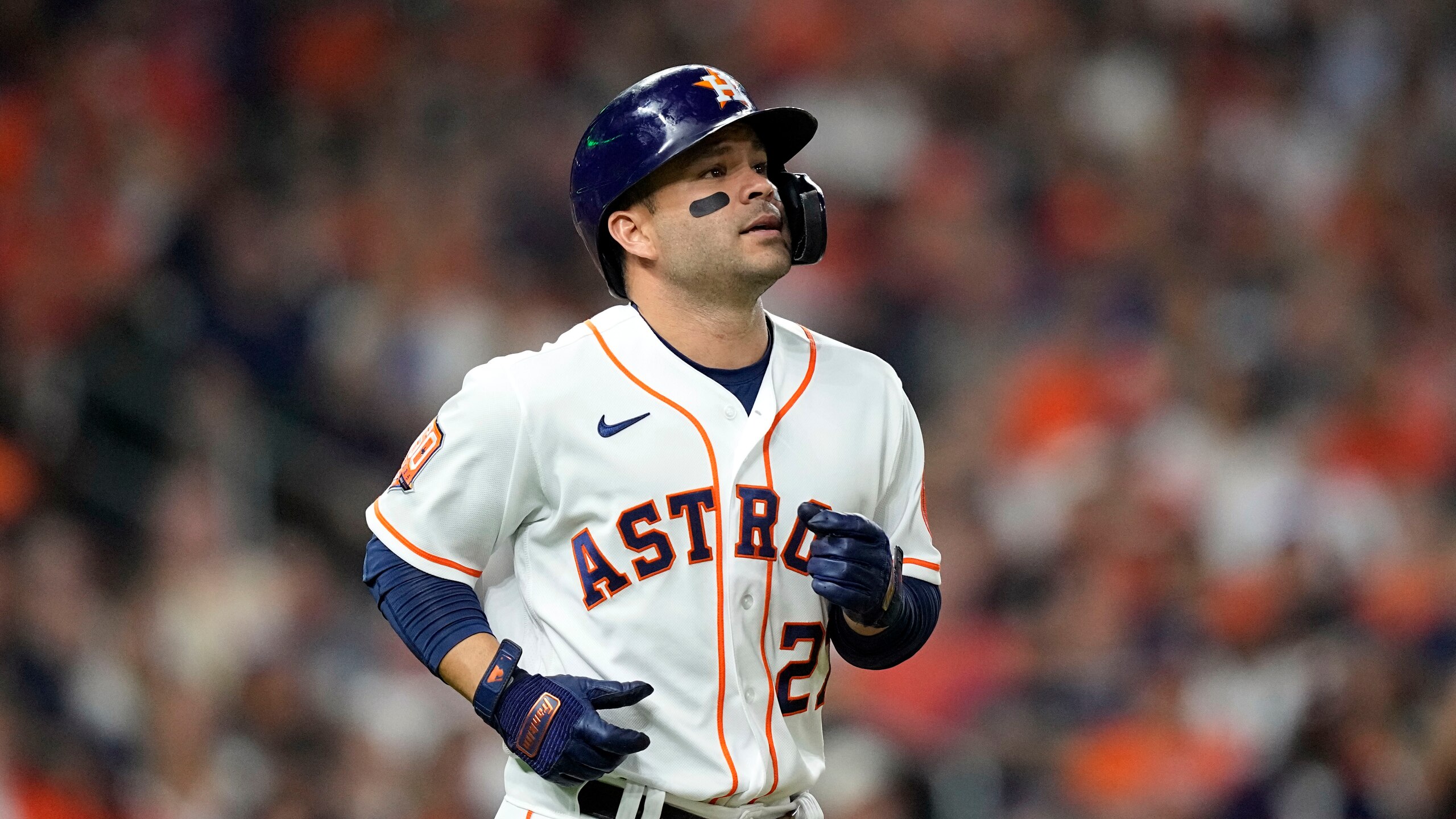 Houston Astros' Jose Altuve runs to first base during the sixth inning of a baseball game against the Los Angeles Angels Monday, April 18, 2022, in Houston. (AP Photo/David J. Phillip)