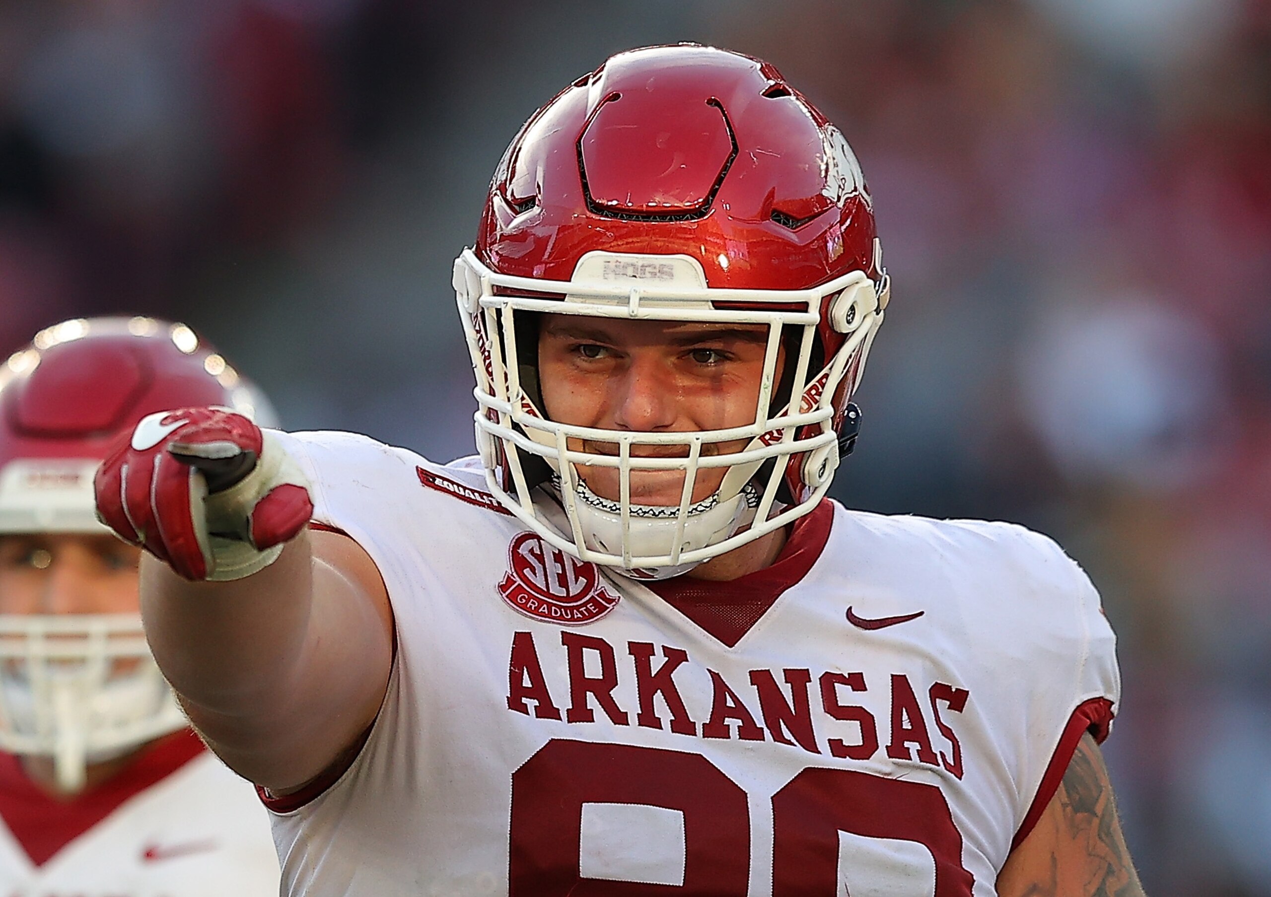 TUSCALOOSA, ALABAMA - NOVEMBER 20: John Ridgeway #99 of the Arkansas Razorbacks reacts after sacking Bryce Young #9 of the Alabama Crimson Tide during the first half at Bryant-Denny Stadium on November 20, 2021 in Tuscaloosa, Alabama. (Photo by Kevin C. Cox/Getty Images) TUSCALOOSA, ALABAMA - NOVEMBER 20: John Ridgeway #99 of the Arkansas Razorbacks reacts after sacking Bryce Young #9 of the Alabama Crimson Tide during the first half at Bryant-Denny Stadium on November 20, 2021 in Tuscaloosa, Alabama. (Photo by Kevin C. Cox/Getty Images)