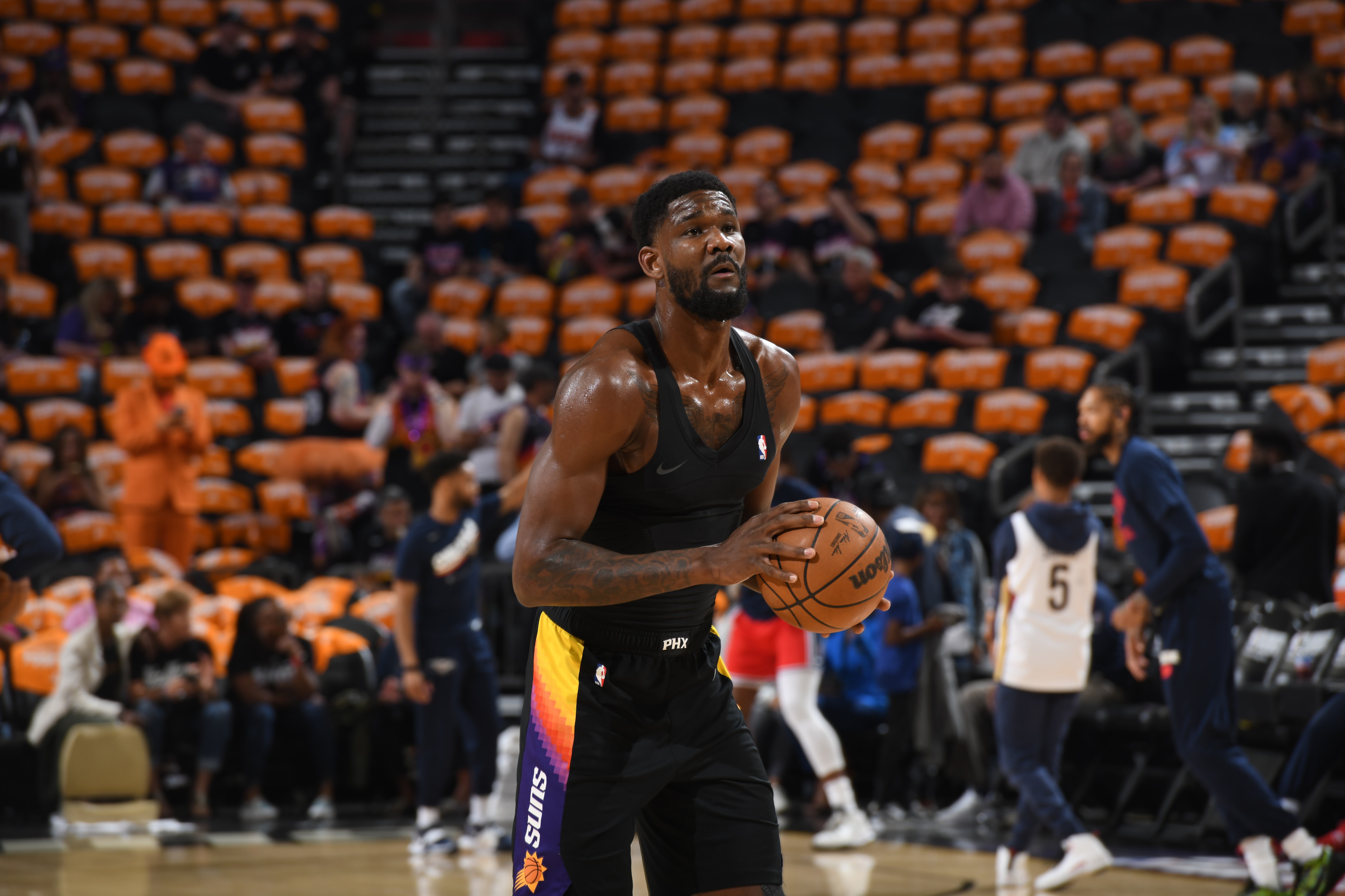PHOENIX, AZ - APRIL 17: Deandre Ayton #22 of the Phoenix Suns warms up before Round 1 Game 1 of the 2022 NBA Playoffs against New Orleans Pelicans on April 17, 2022 at Footprint Center in Phoenix, Arizona. NOTE TO USER: User expressly acknowledges and agrees that, by downloading and or using this photograph, user is consenting to the terms and conditions of the Getty Images License Agreement. Mandatory Copyright Notice: Copyright 2022 NBAE (Photo by Kate Frese/NBAE via Getty Images)